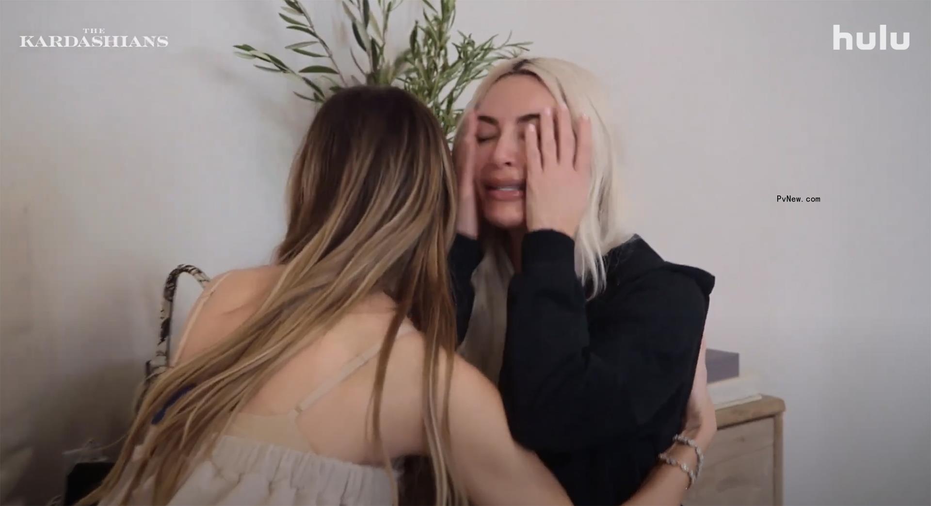 Kim Kardashian crying and hugging Khloe Kardashian 