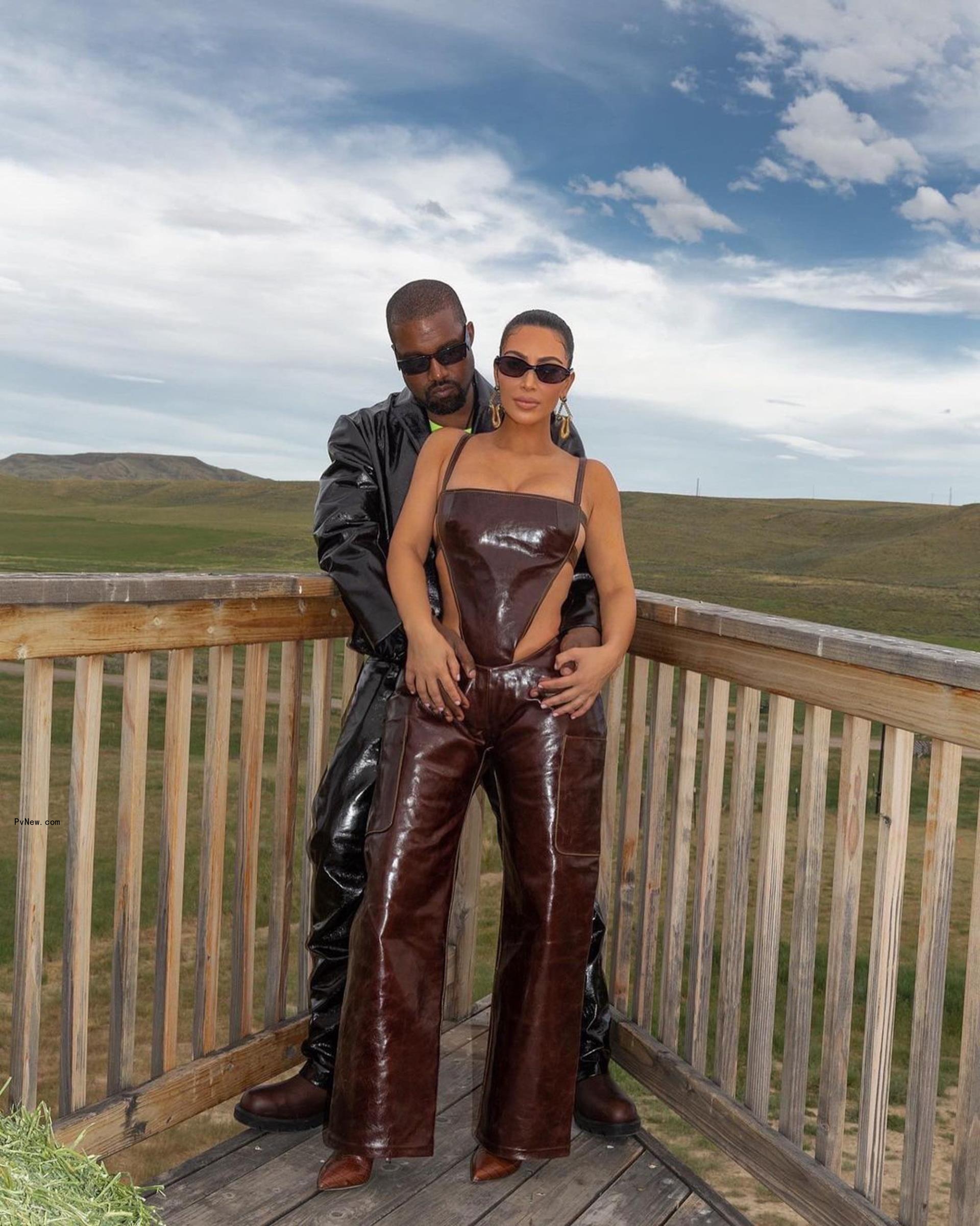 Kanye West and Kim Kardashian posing together 