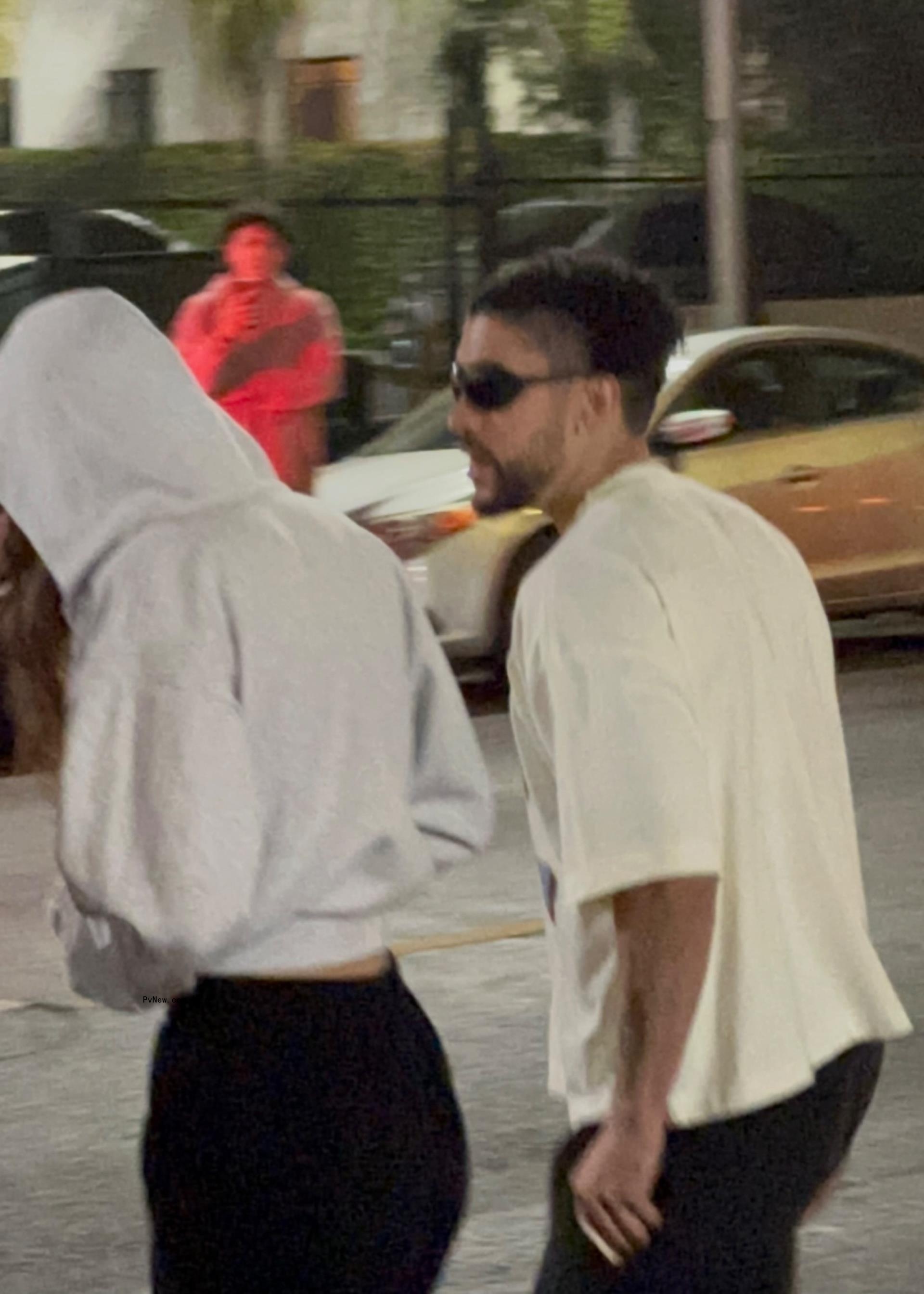 Kendall Jenner and Bad Bunny leaving Tyler, the Creator's show.