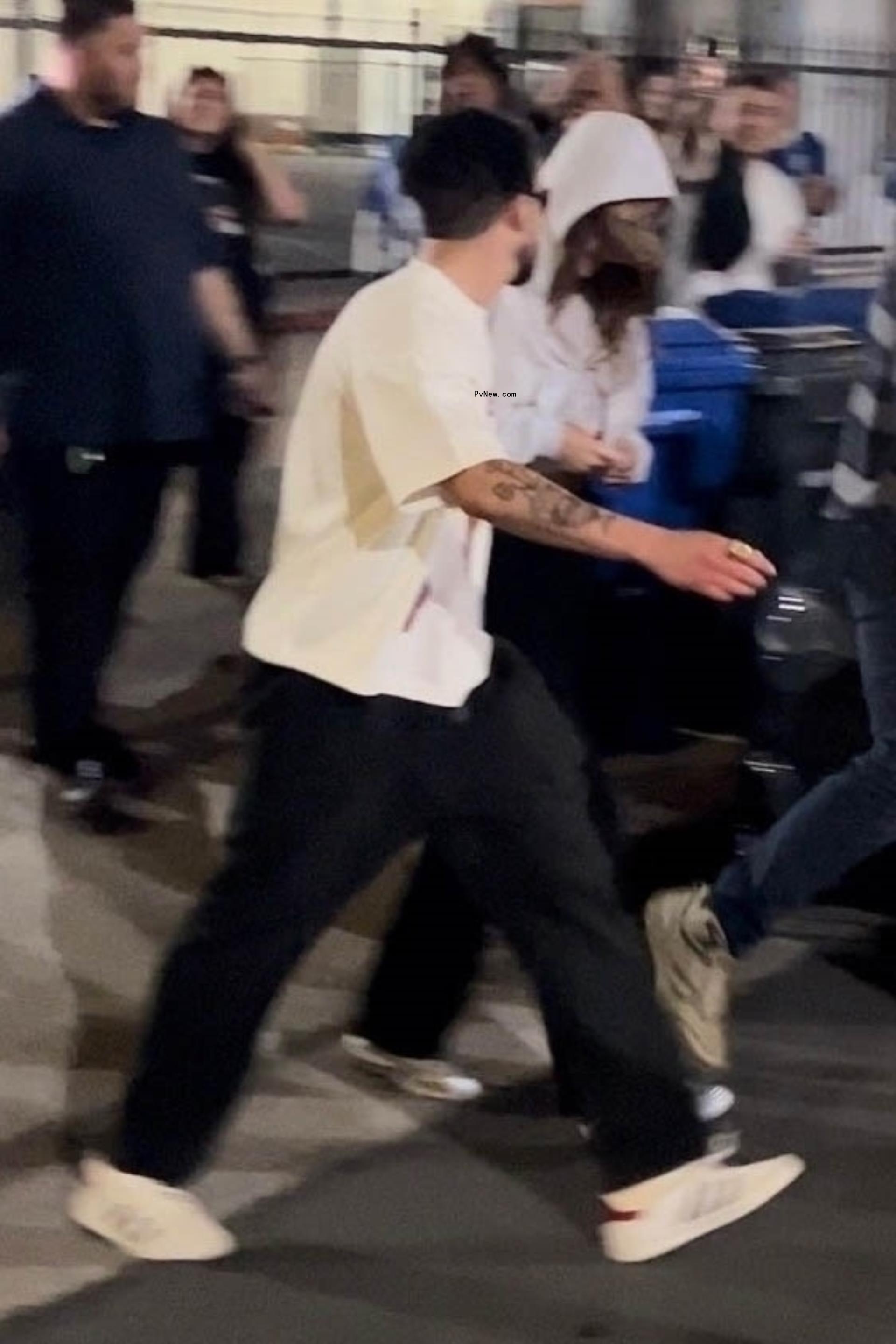 Kendall Jenner and Bad Bunny leaving Tyler, the Creator's show.