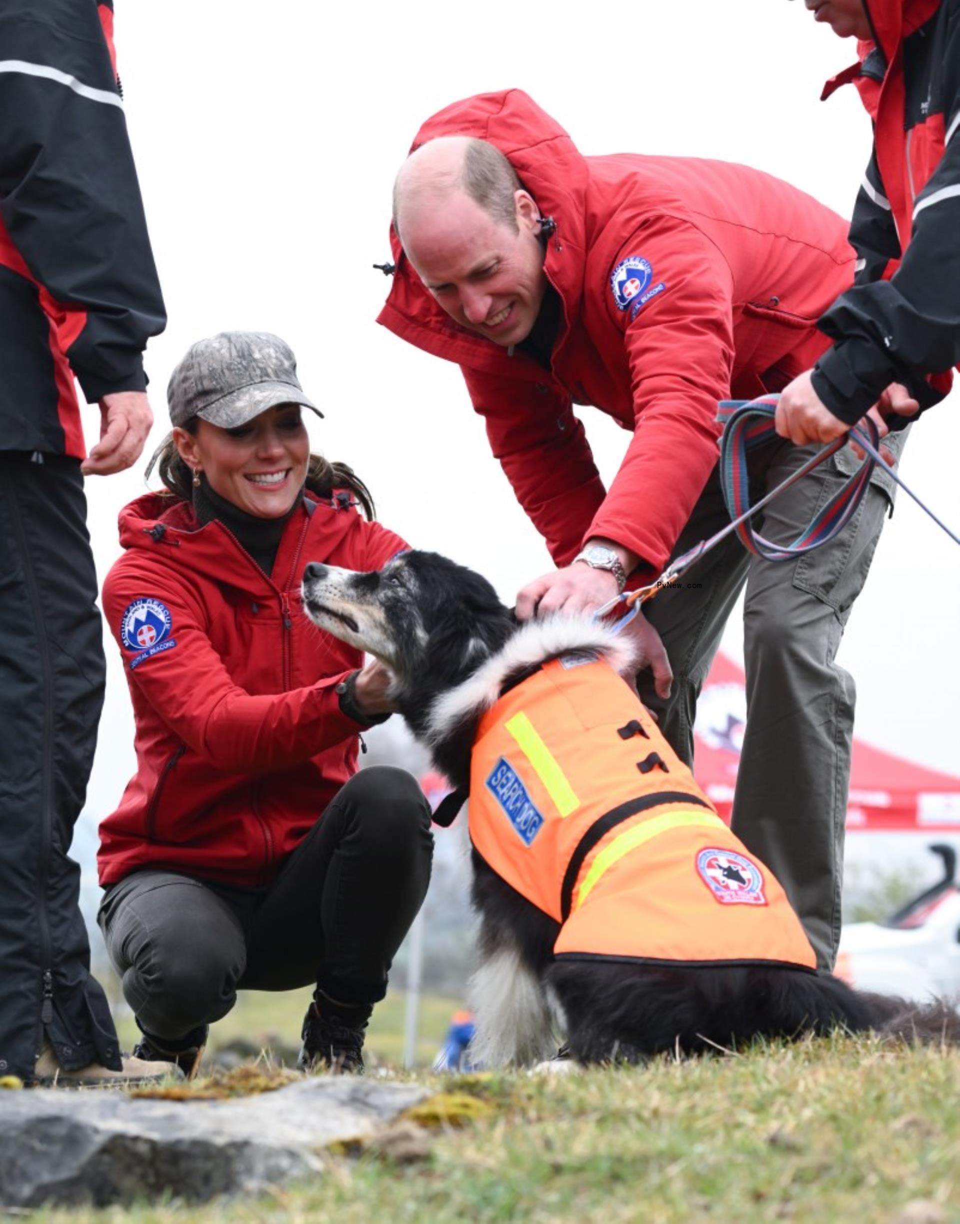 Kate Middleton and Prince William petting dog