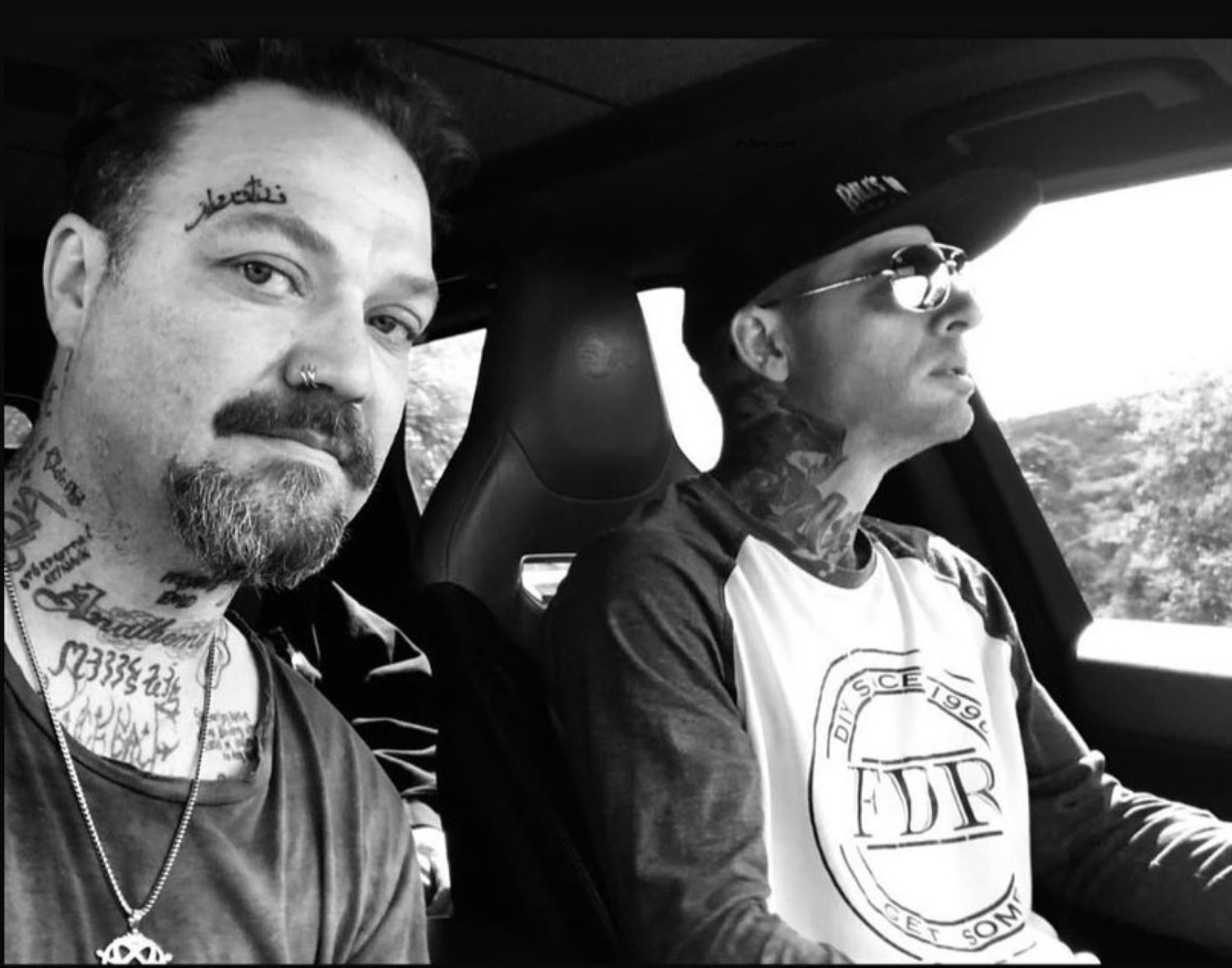 Bam Margera in a car with a friend.