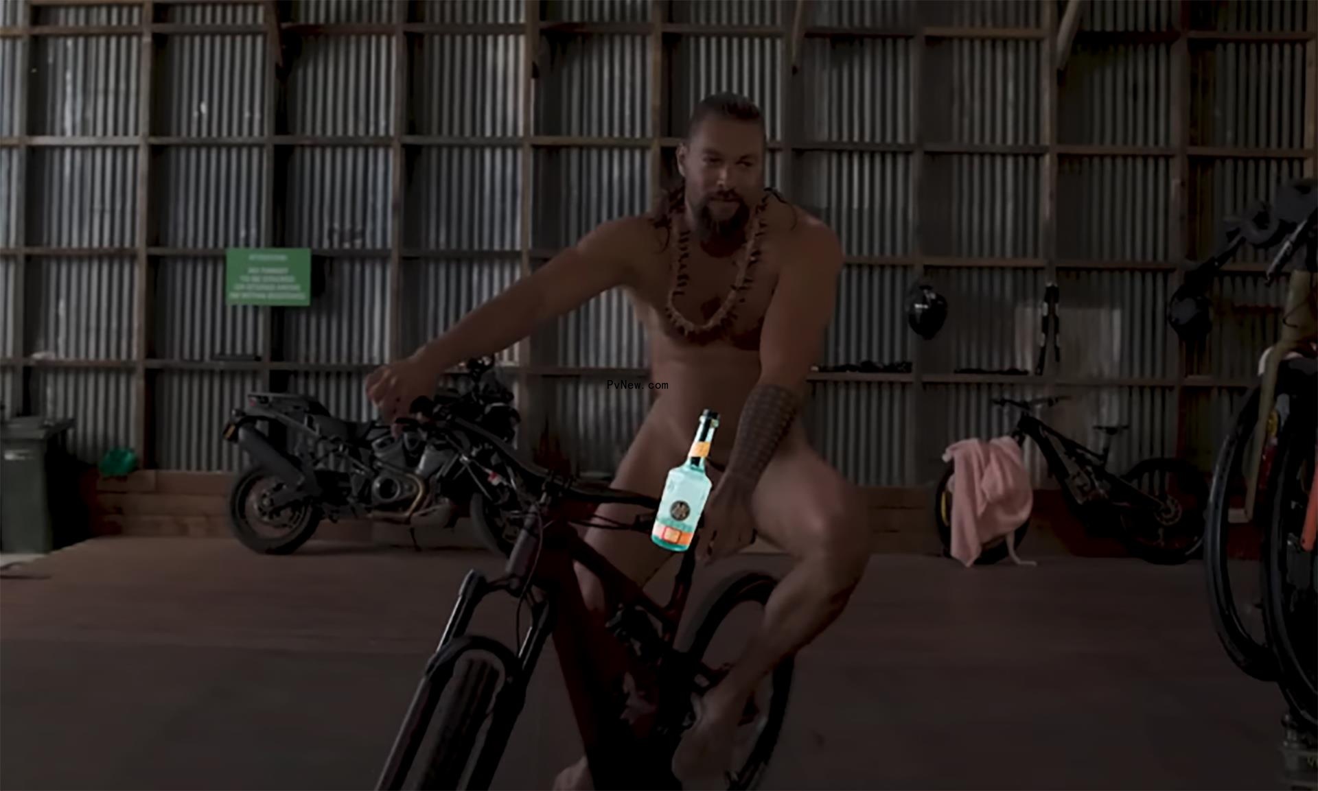 Jason Momoa riding a bike nude