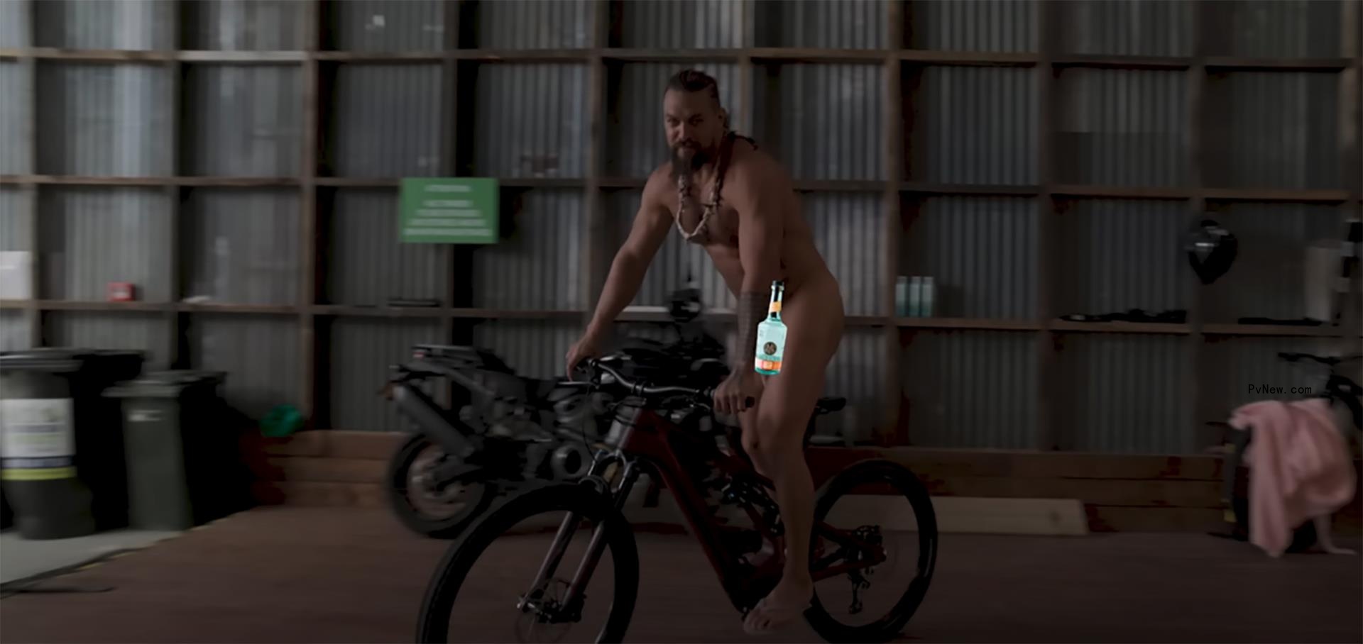 Jason Momoa riding a bike nude