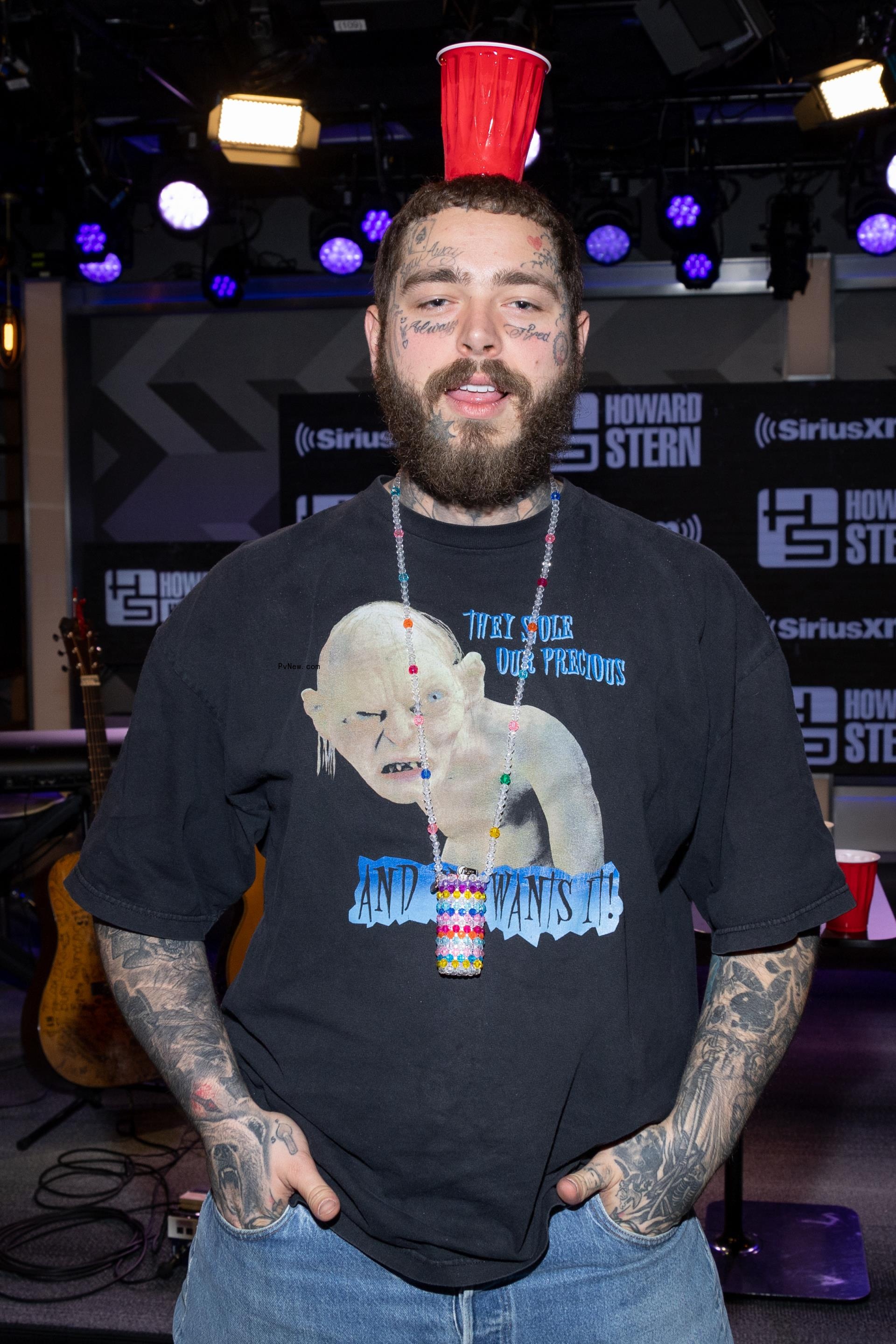 Post Malone posing for a photo at the 