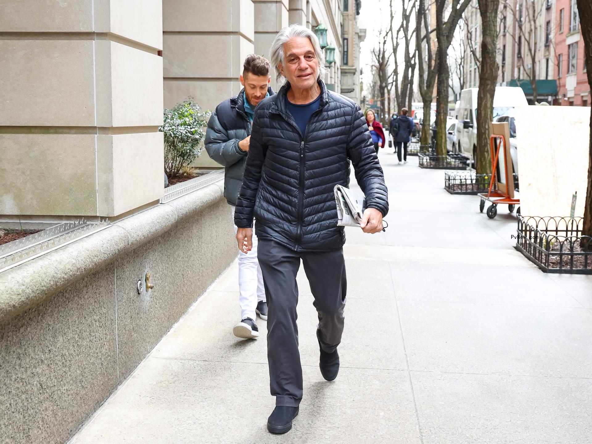 Tony Danza walks outside