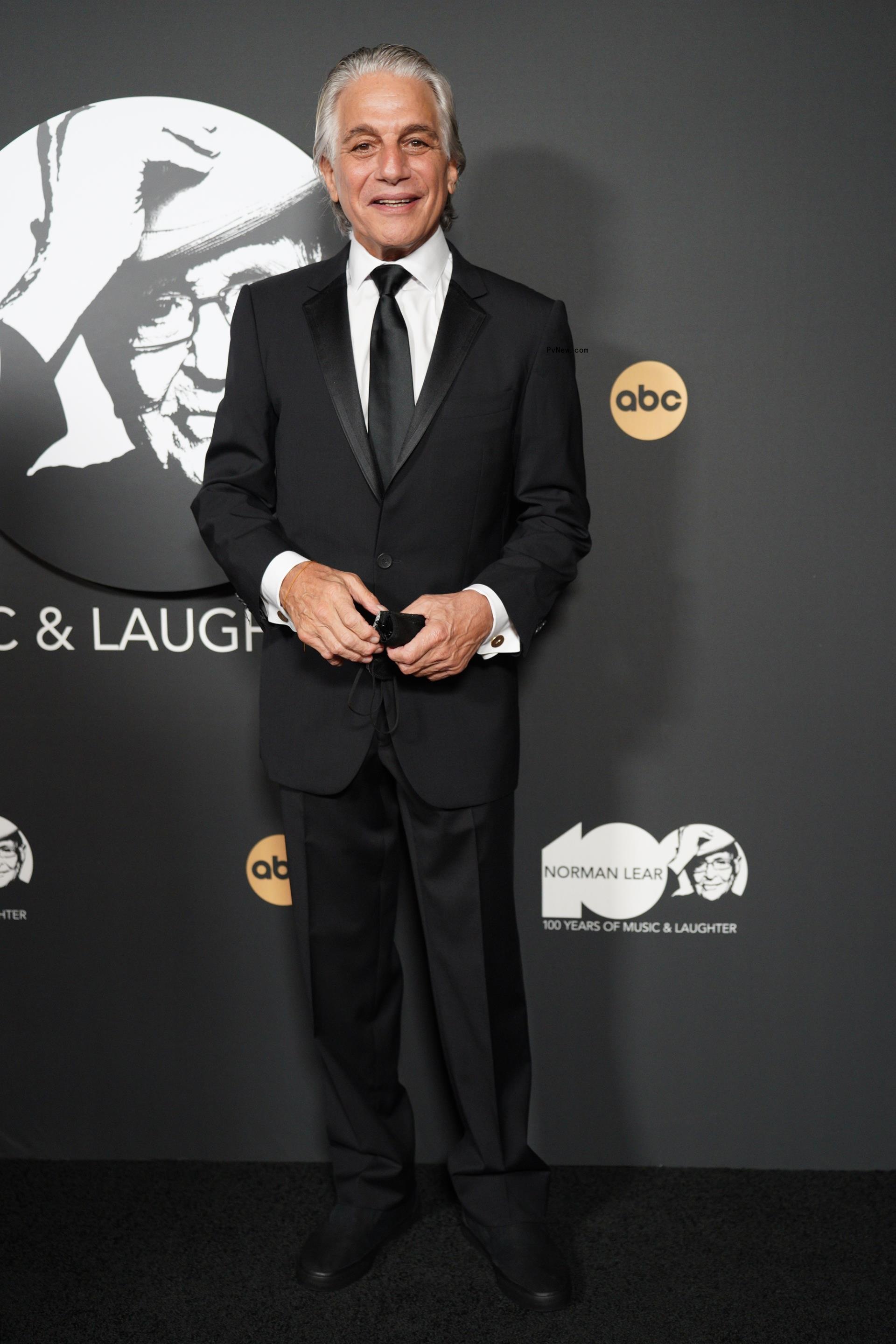 Tony Danza suited on red carpet