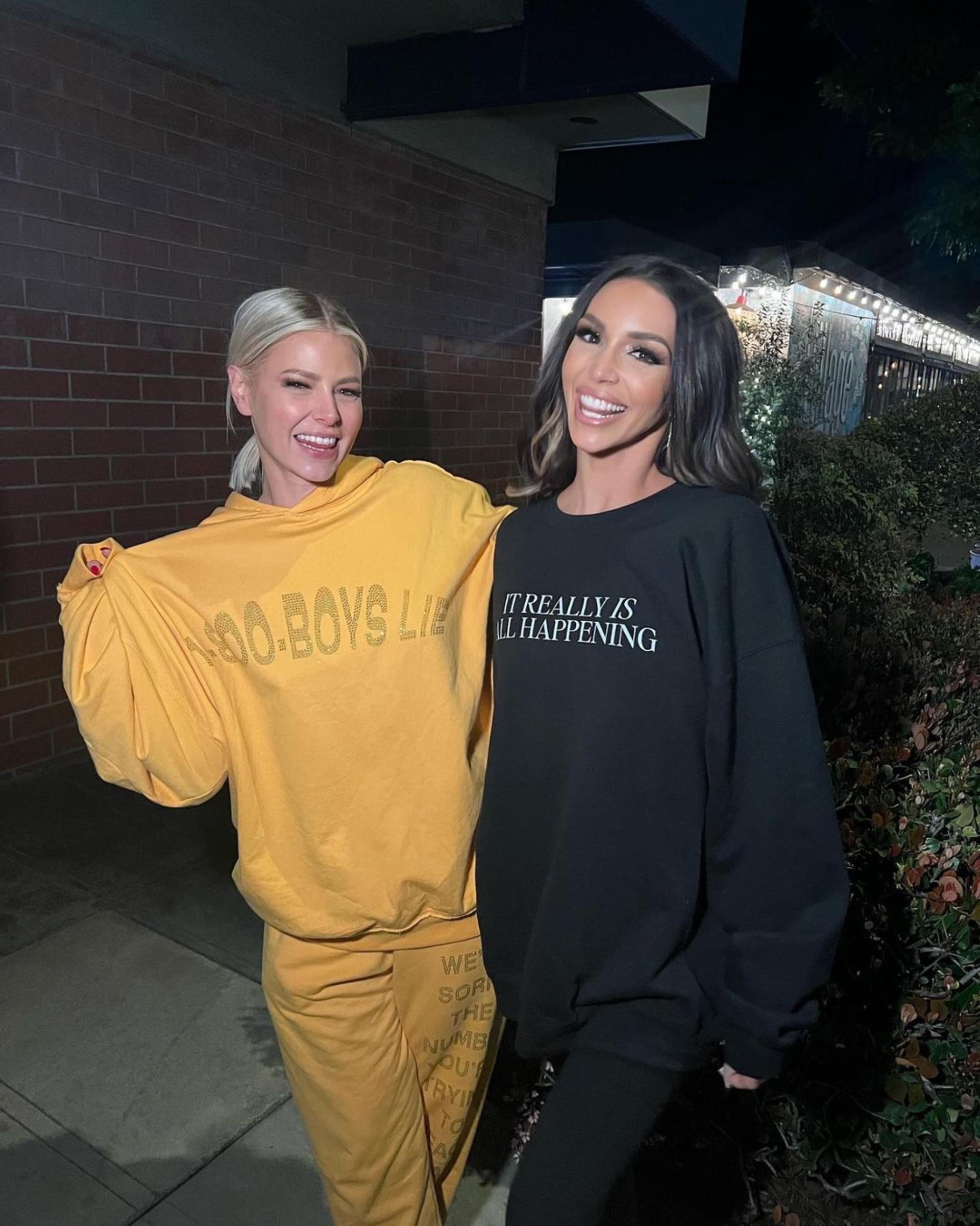 Ariana Madix and Scheana Shay smile in sweatshirts