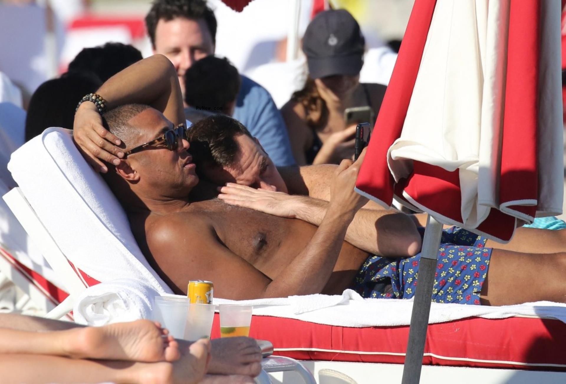 Don Lemon lounging on the beach.