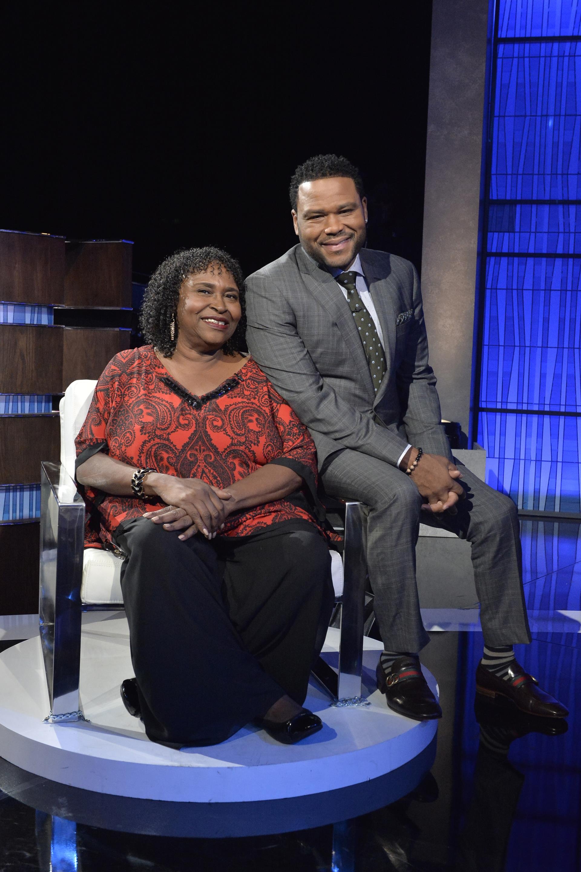 Anthony Anderson and his mom posing together at a TV taping