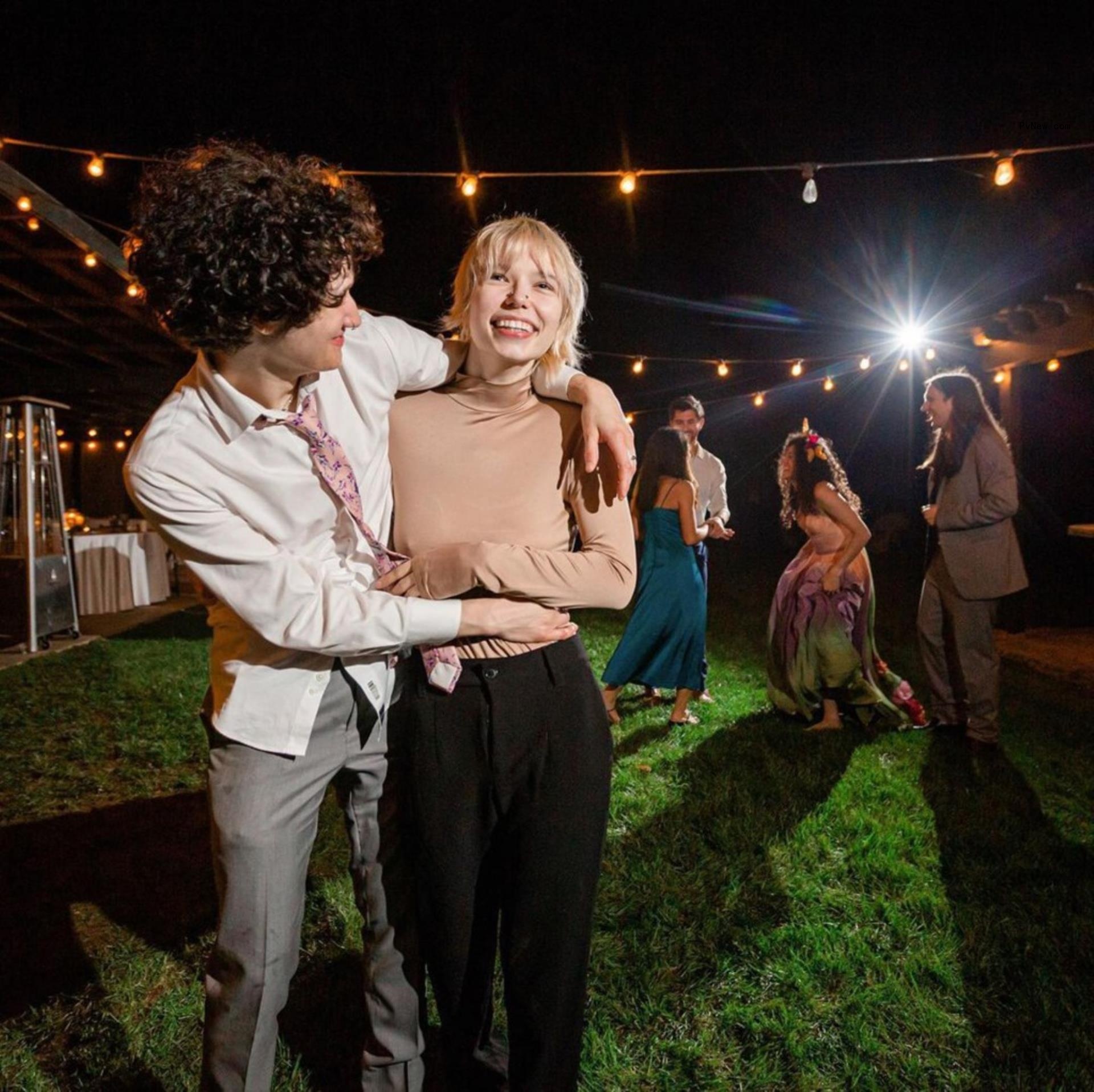 a person with their arms wrapped around stevie mathers