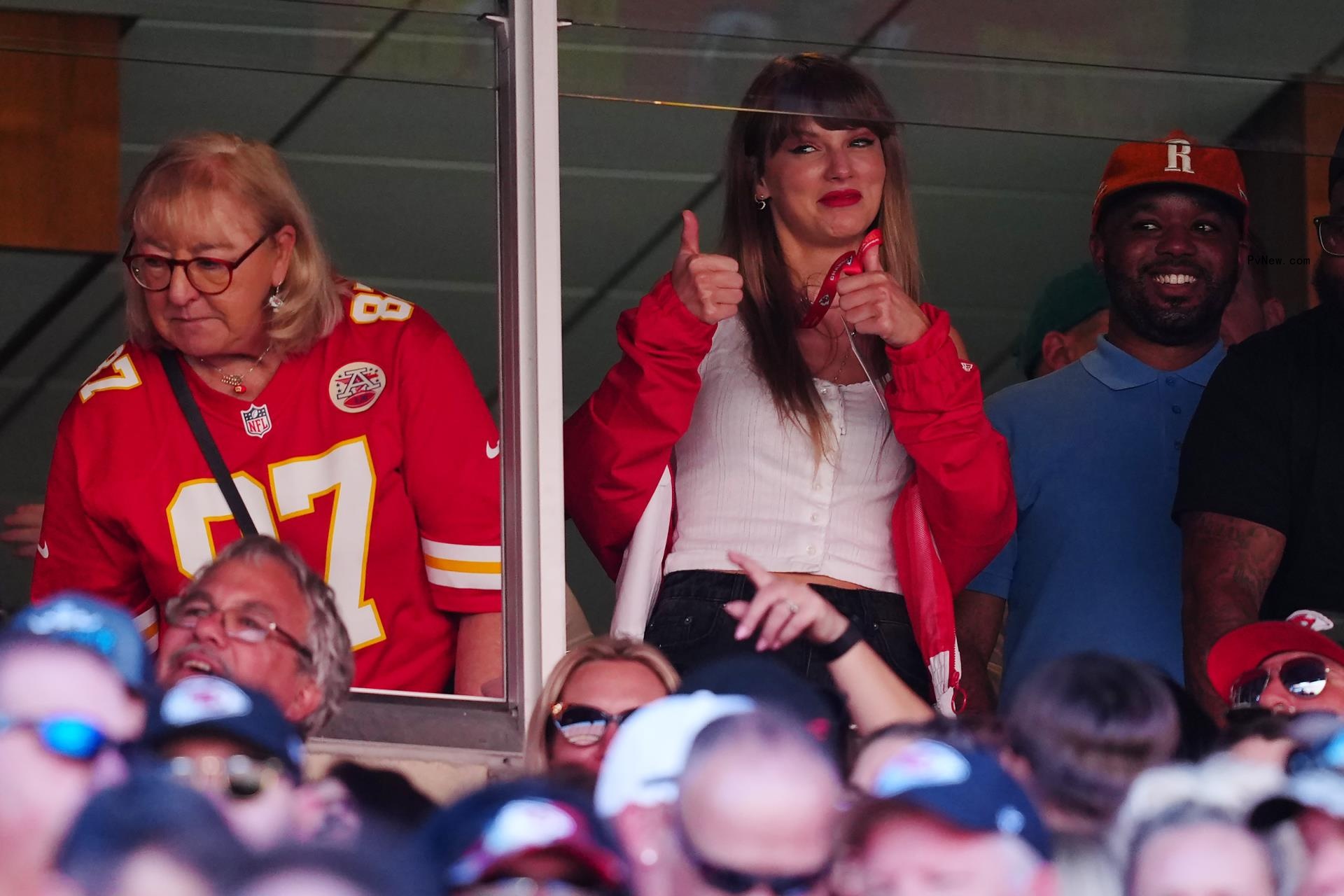 Taylor Swift watching Travis Kelce's game.