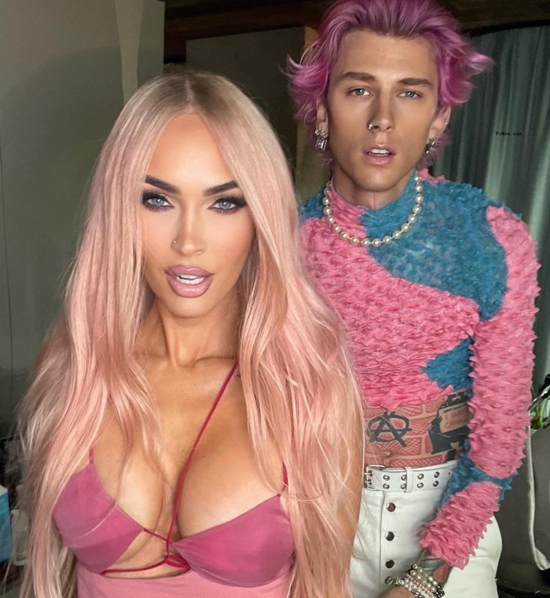 Megan Fox and Machine Gun Kelly both with pink hair. 