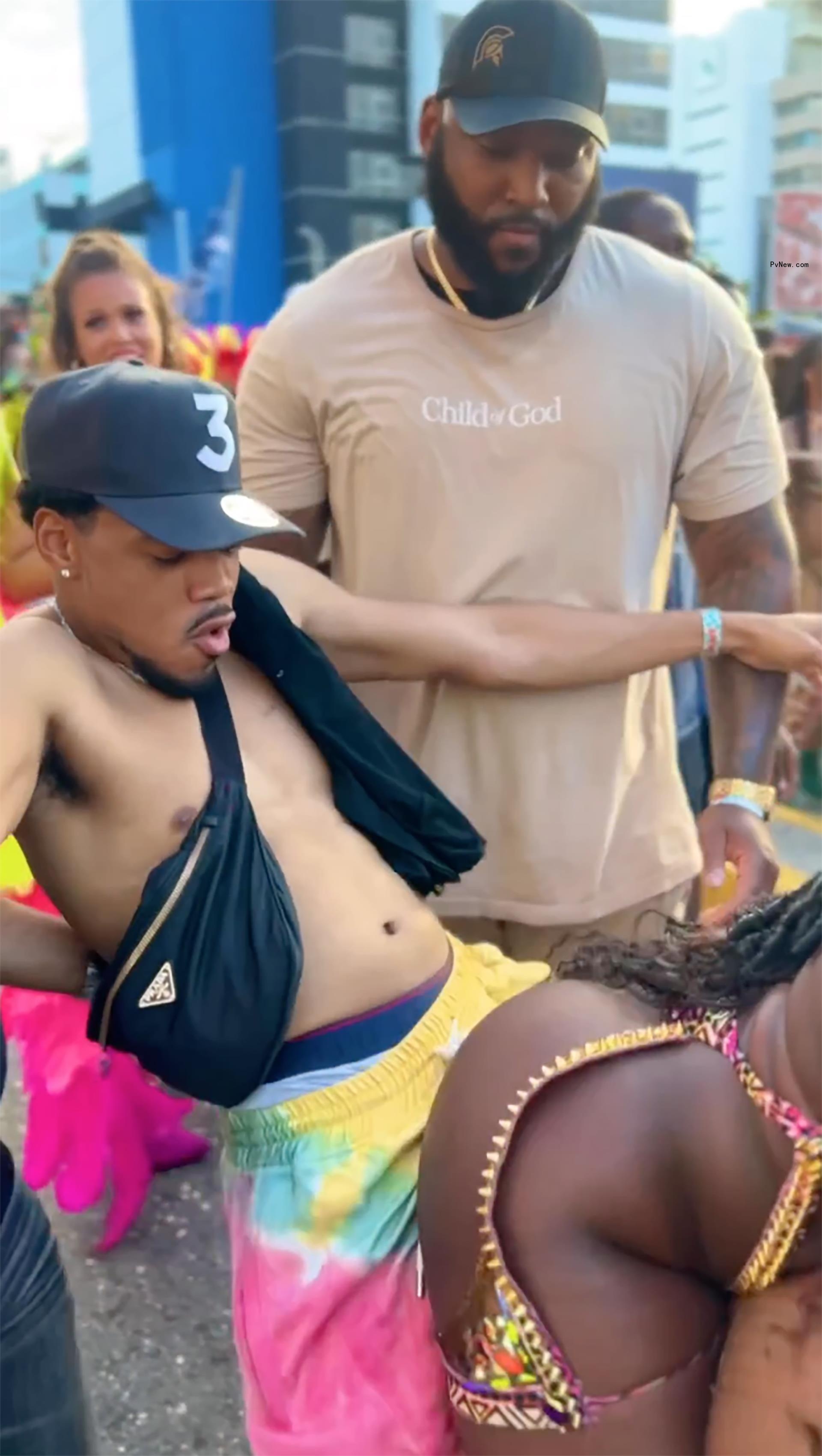 Chance the Rapper dancing with a woman in Jamaica.