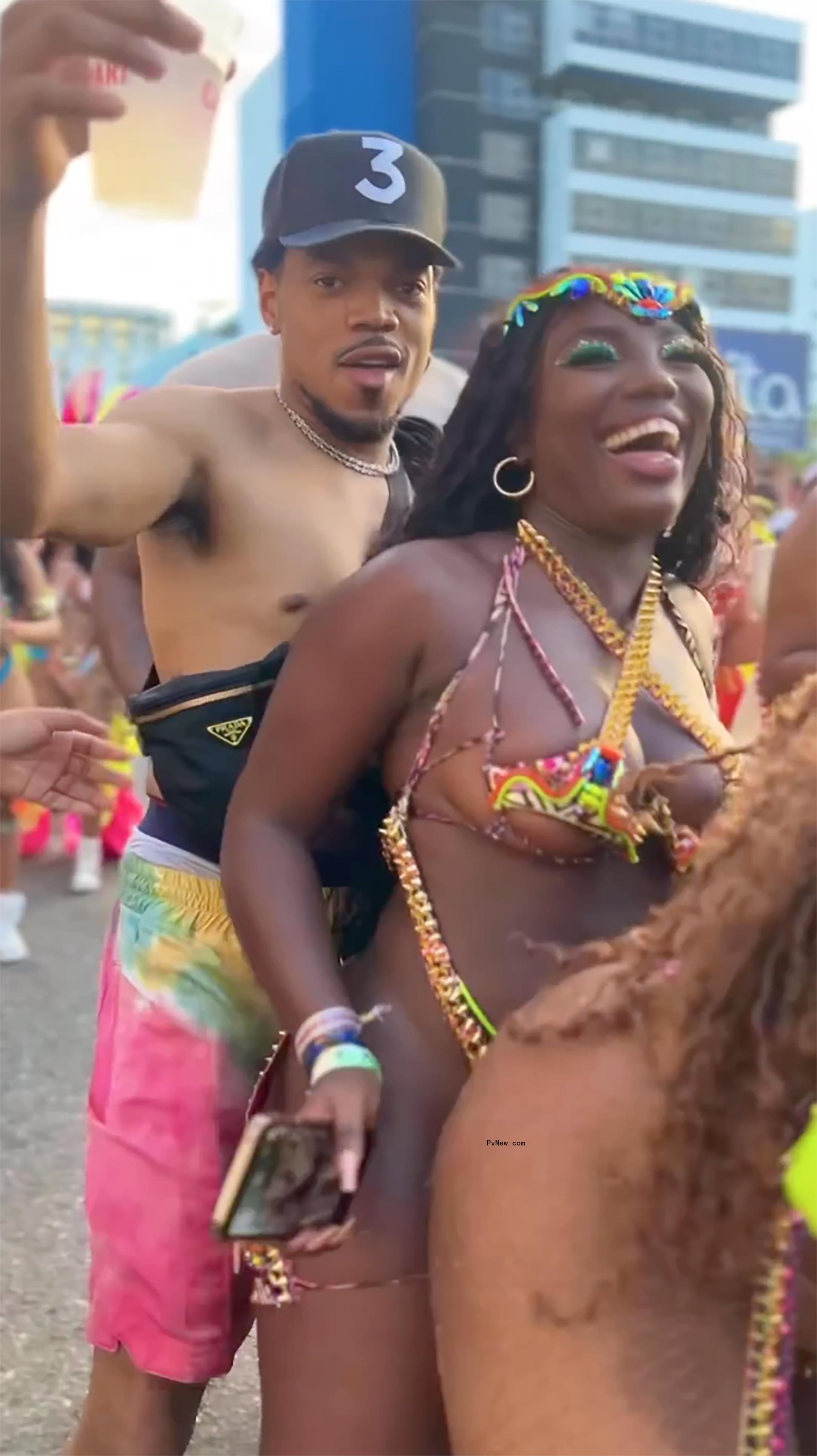 Chance the Rapper dancing with a woman in Jamaica.