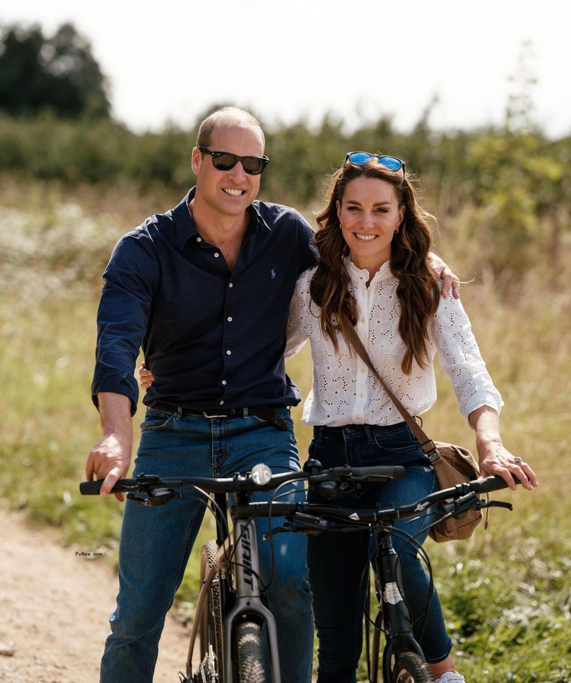 Prince William and Kate Middleton riding bikes.