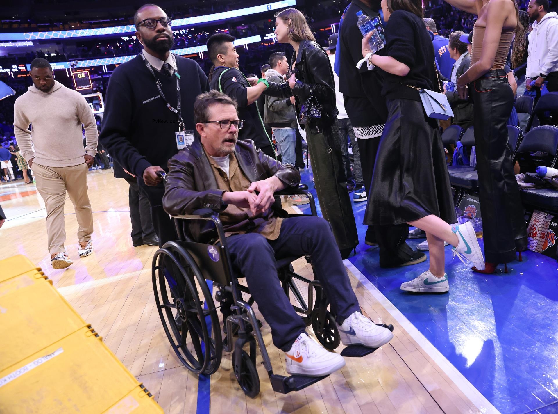 Michael J. Fox in a wheelchair.