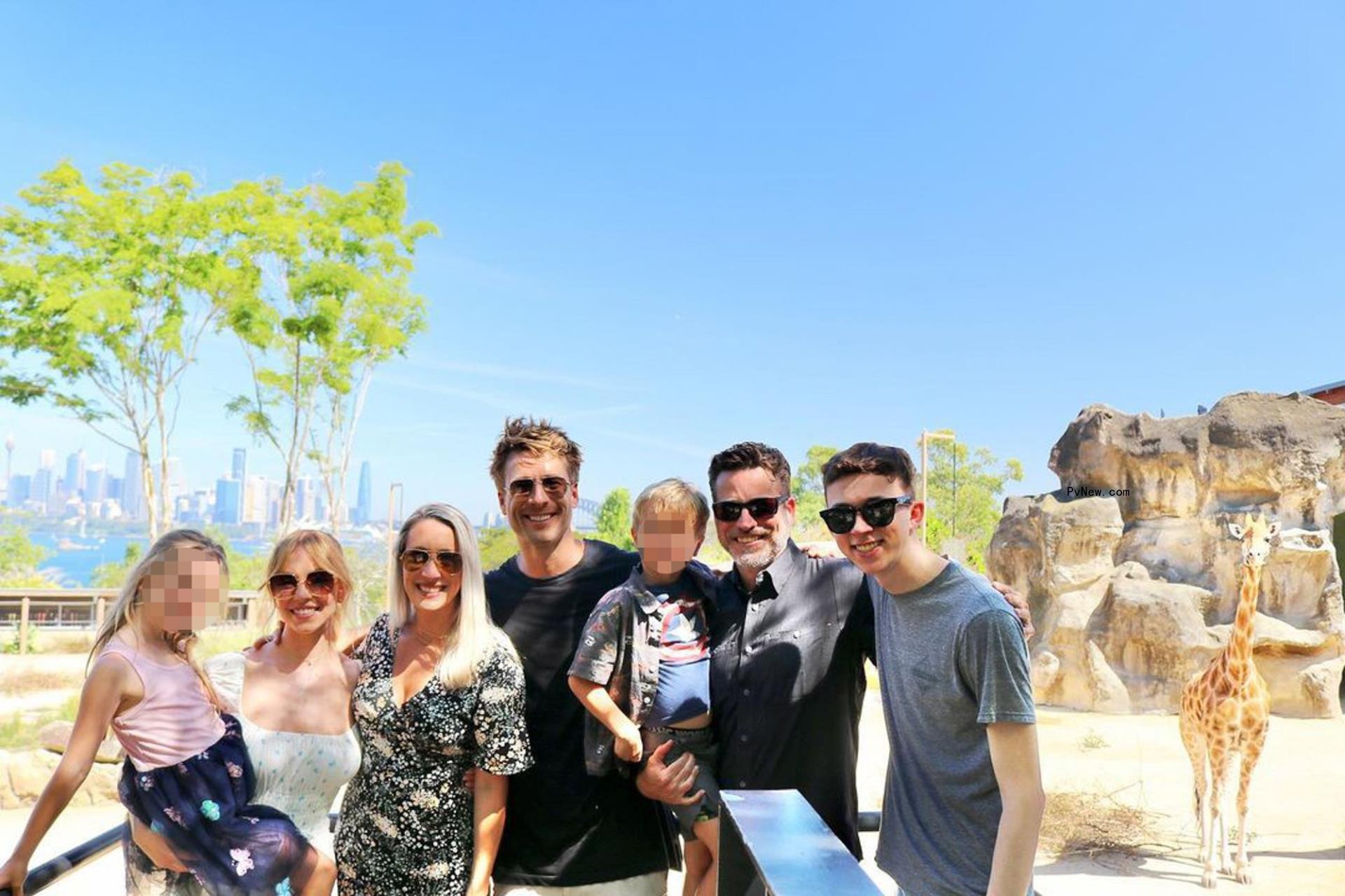 Glen Powell and his family with Sydney Sweeney at the zoo.