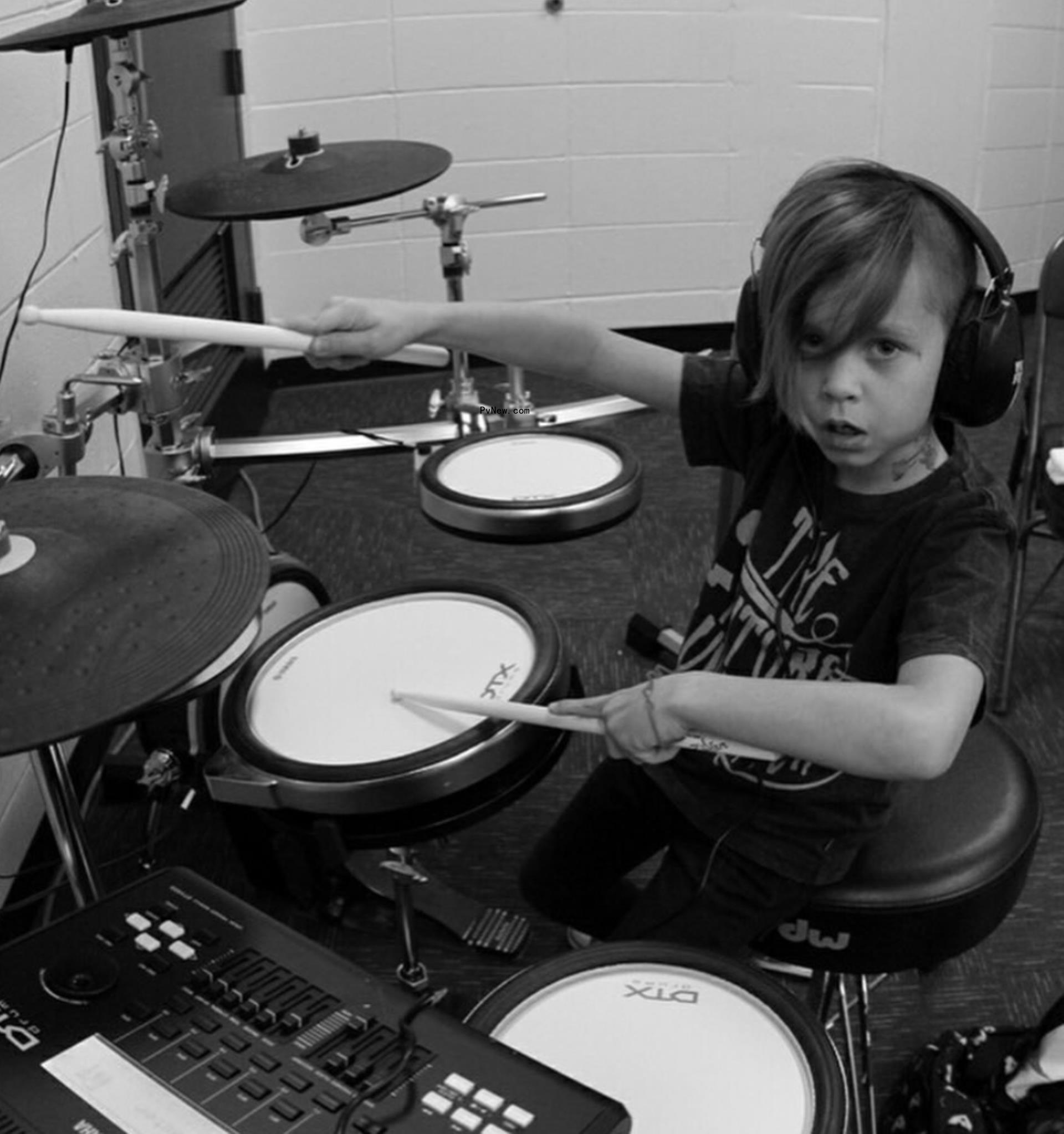A photo of Travis Barker and son Landon