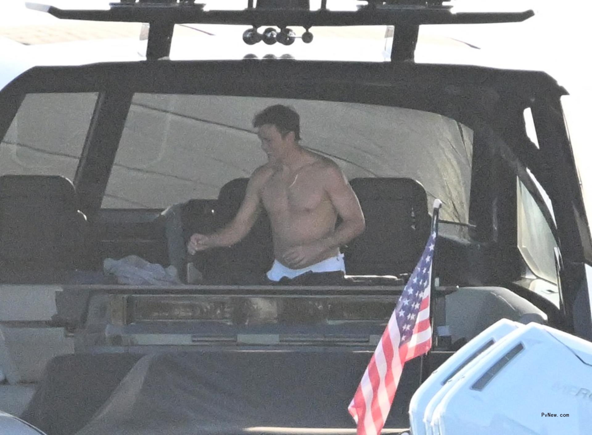 shirtless tom brady on his yacht