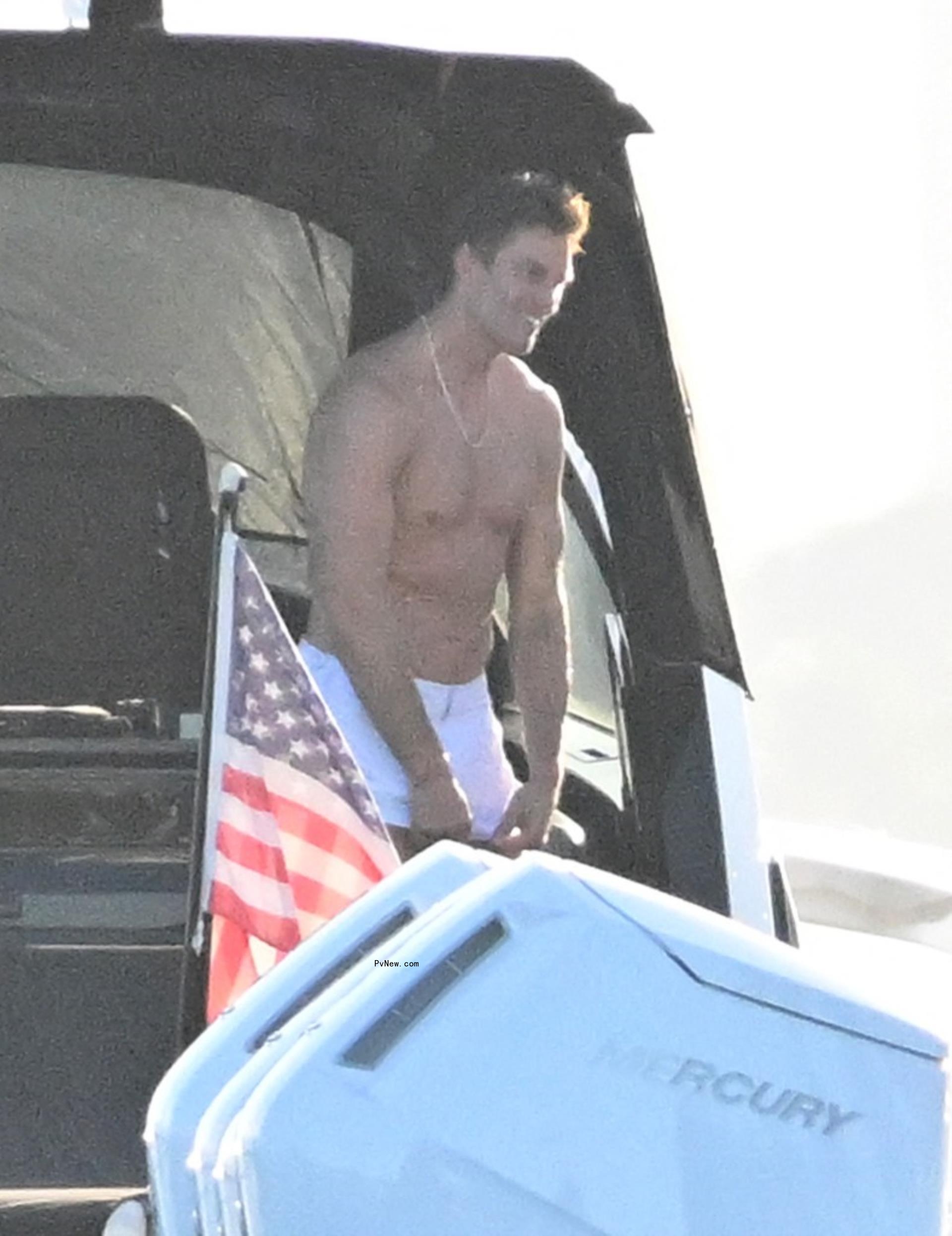 shirtless tom brady on his yacht