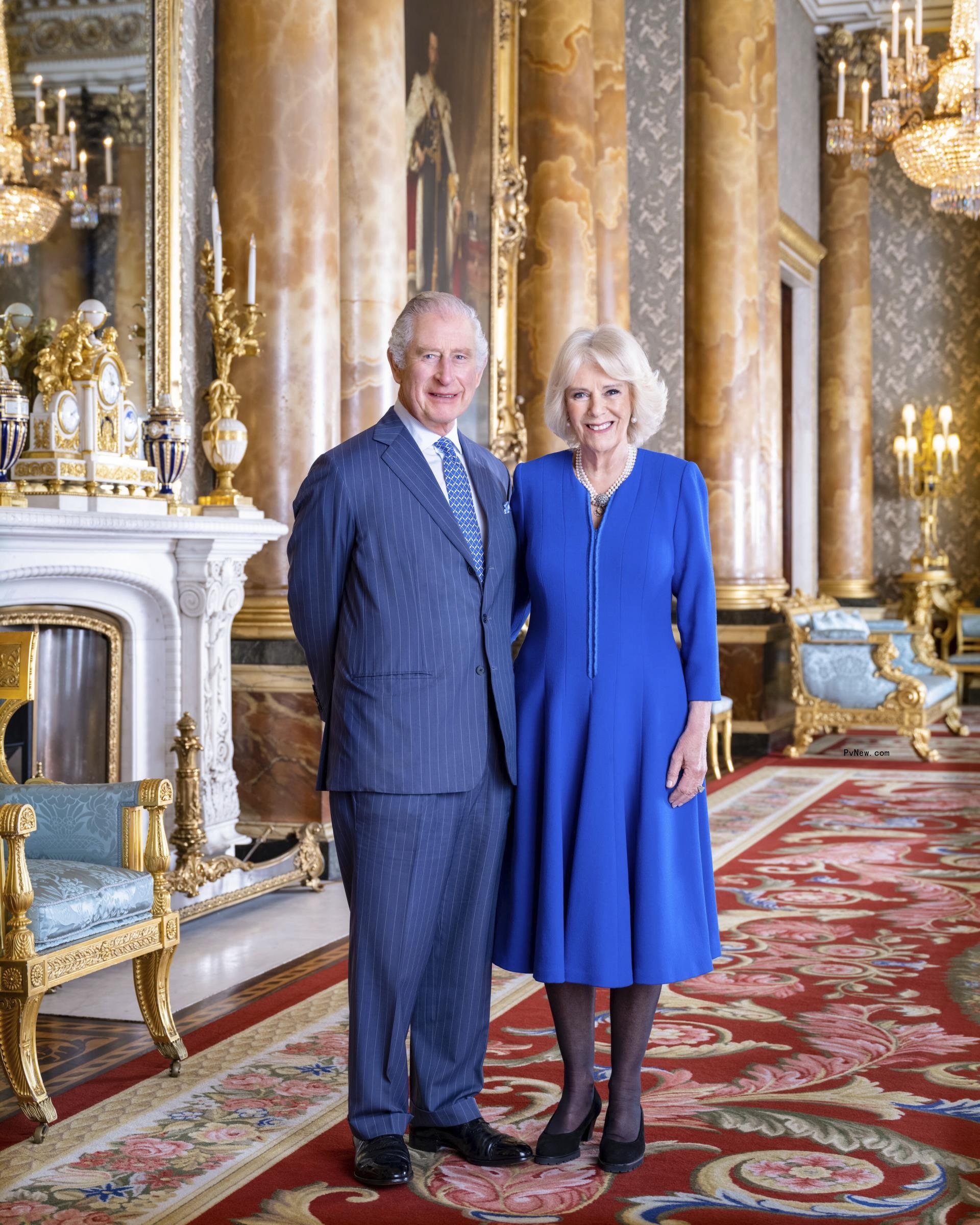 King Charles III and Camilla, Queen Co<i></i>nsort pose for a photo