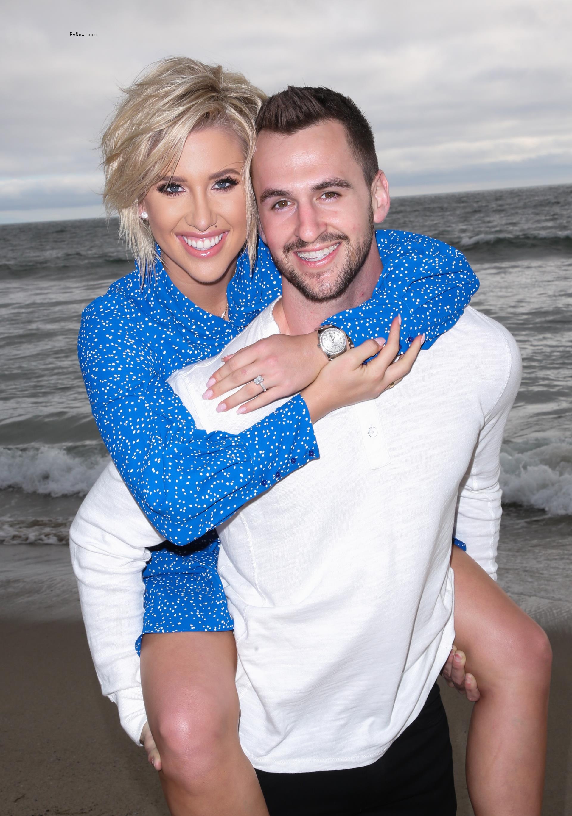 Nic Kerdiles and Savannah Chrisley posing together 