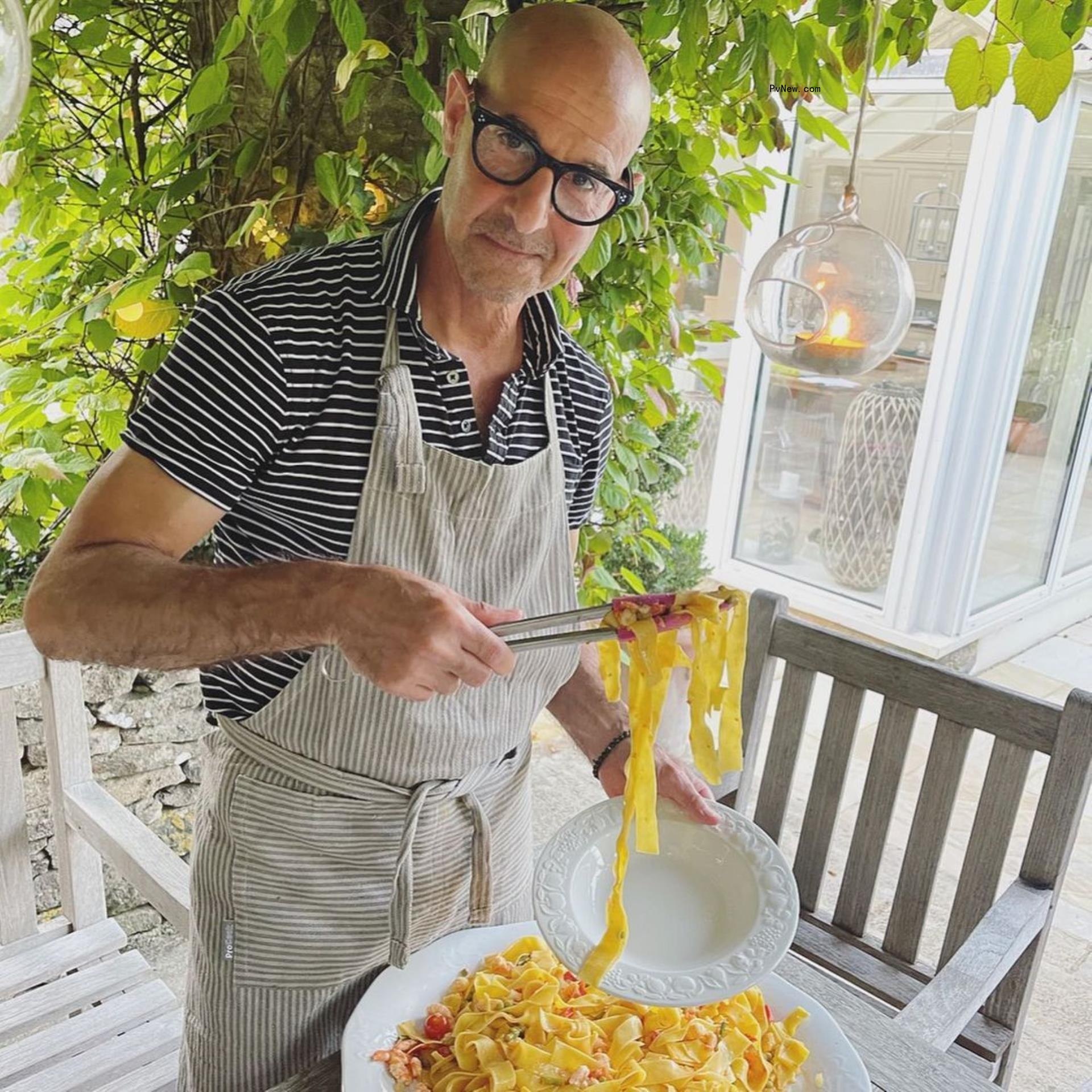 stanley tucci grabbing pasta