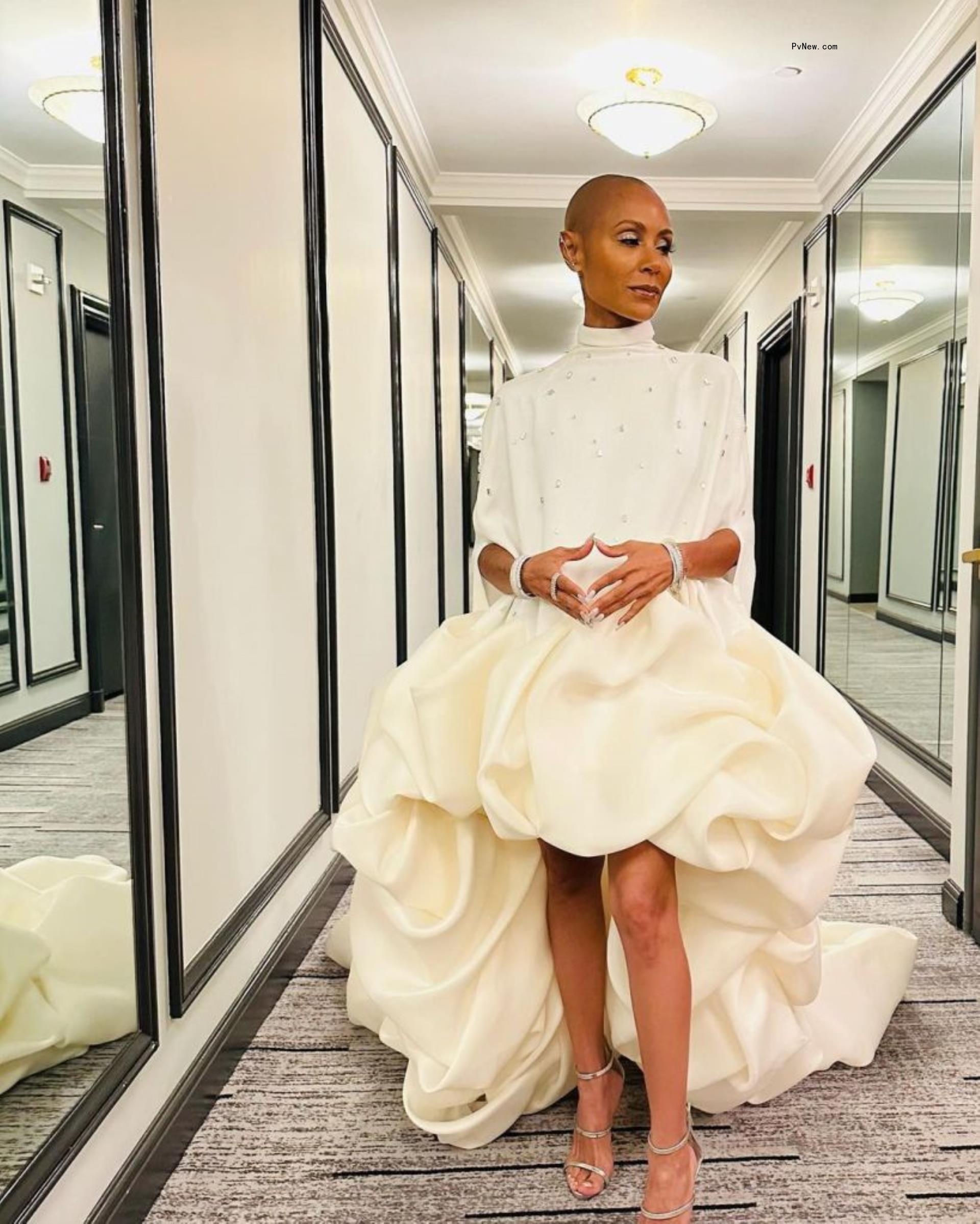 jada pinkett smith posing in a high-low gown