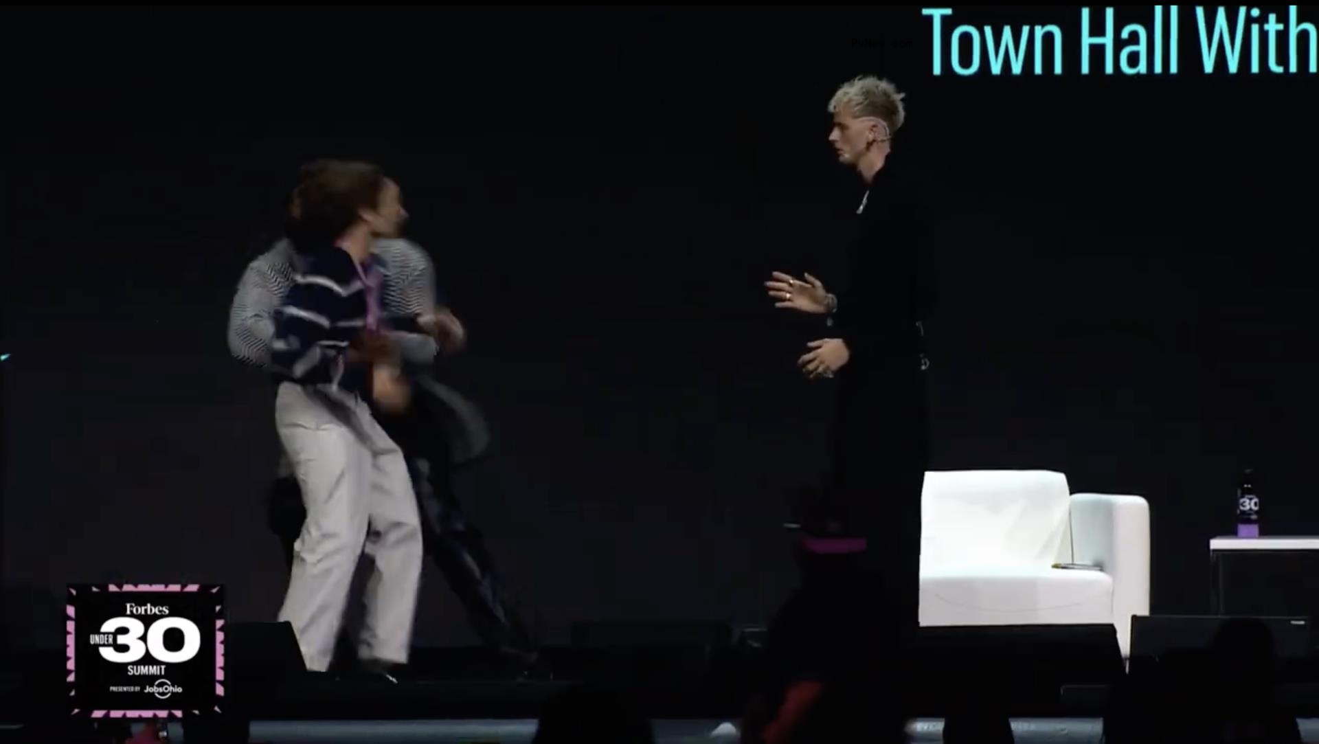 Machine Gun Kelly o<i></i>nstage at Forbes Under 30 Summit