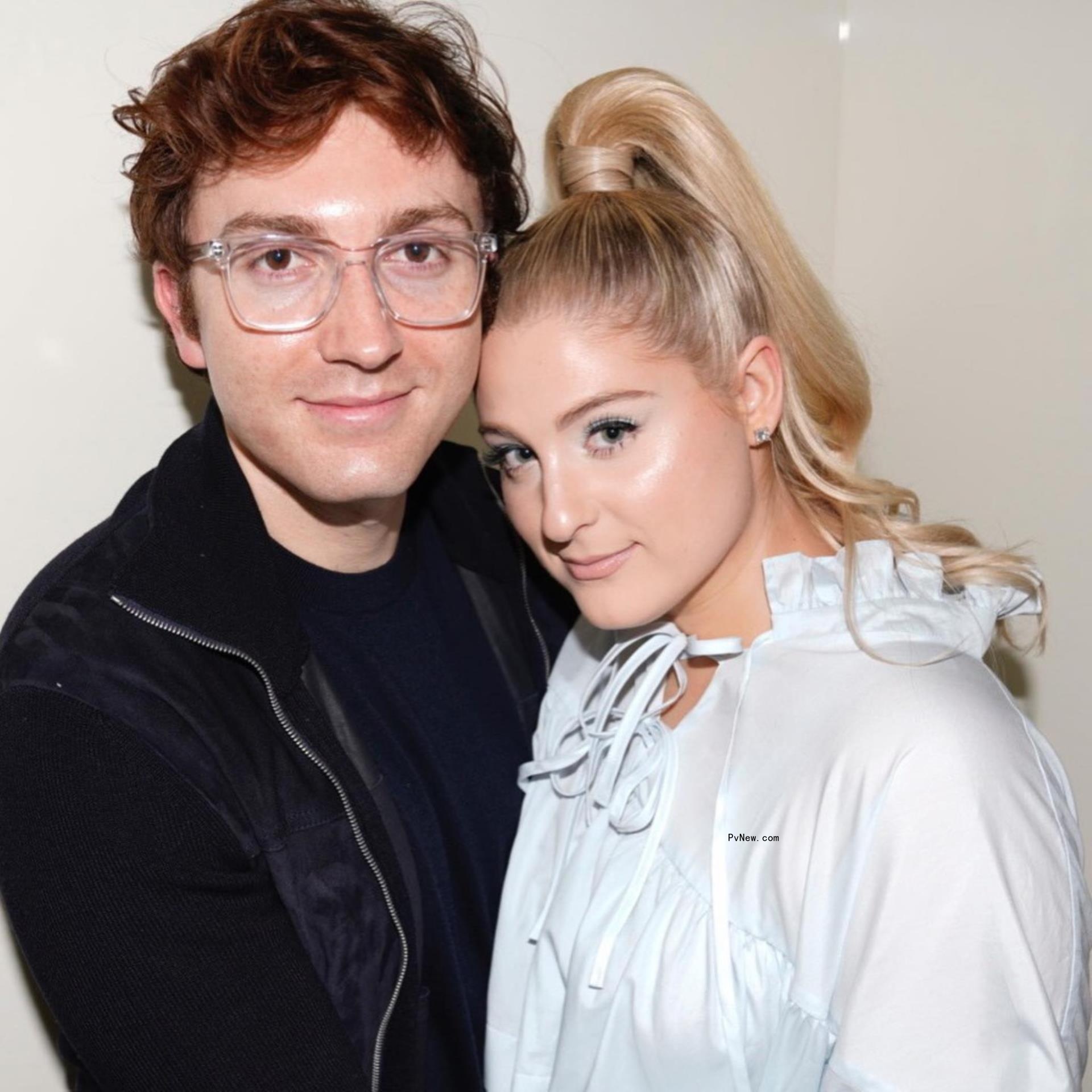 Meghan Trainor cuddles up to Daryl Sabara