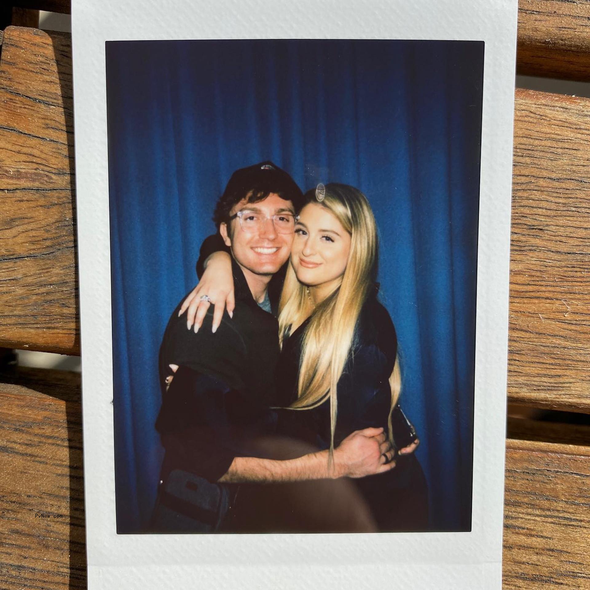 Meghan Trainor and Daryl Sabara hug in Polaroid
