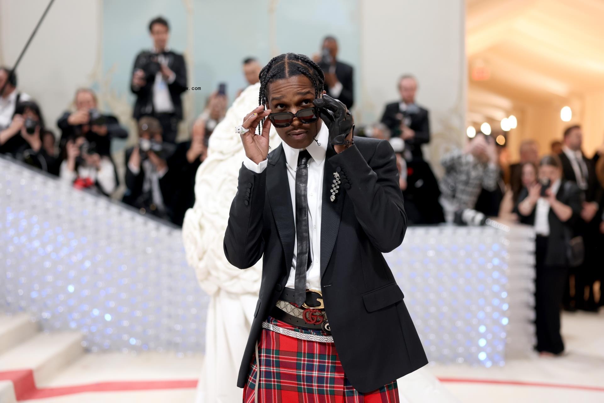 A$AP Rocky at the Met wearing a kilt and sunglasses