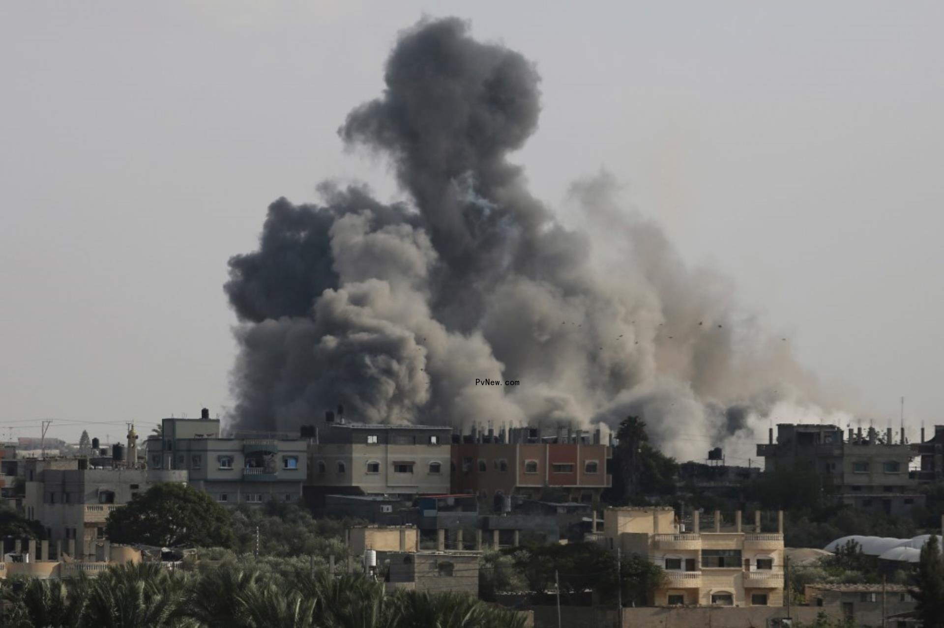 FILE - Smoke rises from an explosion caused by Israeli airstrikes on the border between Egypt and Rafah, Gaza Strip,