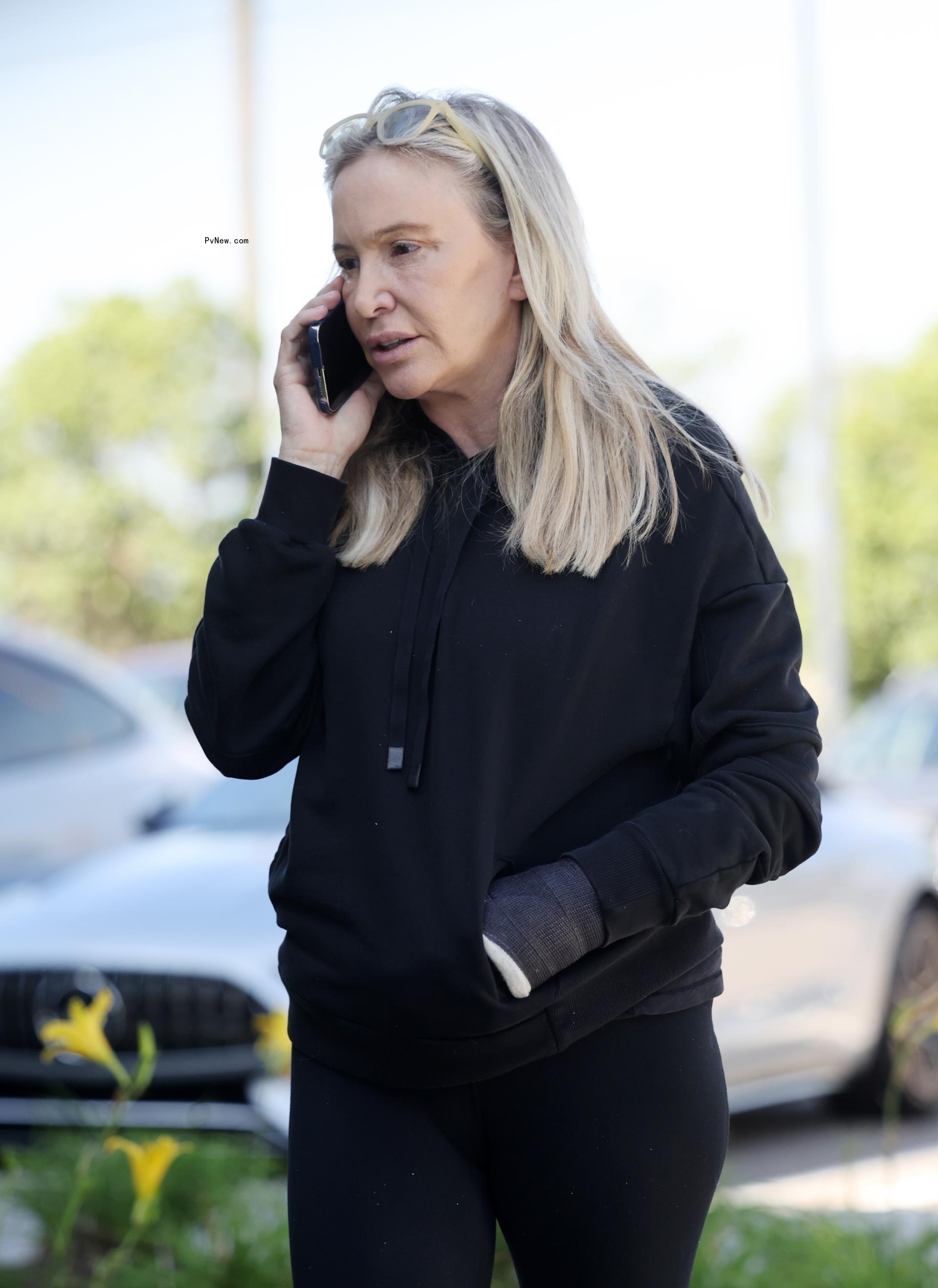 Shannon Beador walking and talking on the phone