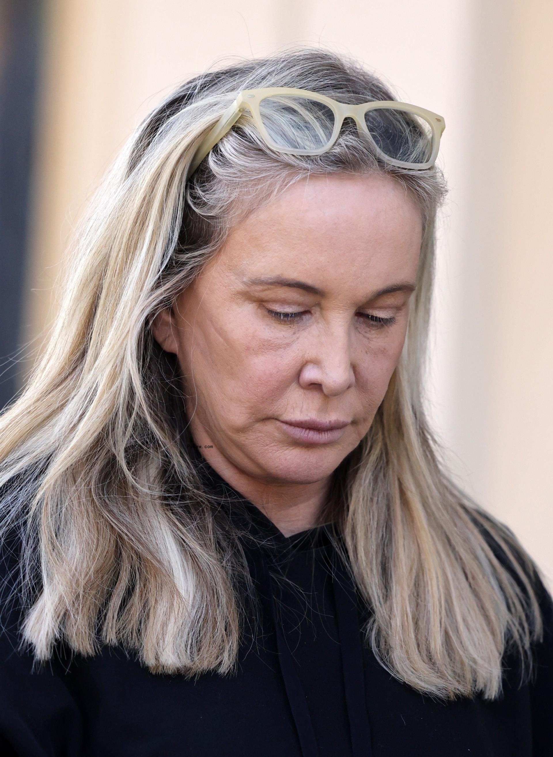 Shannon Beador walking and talking on the phone