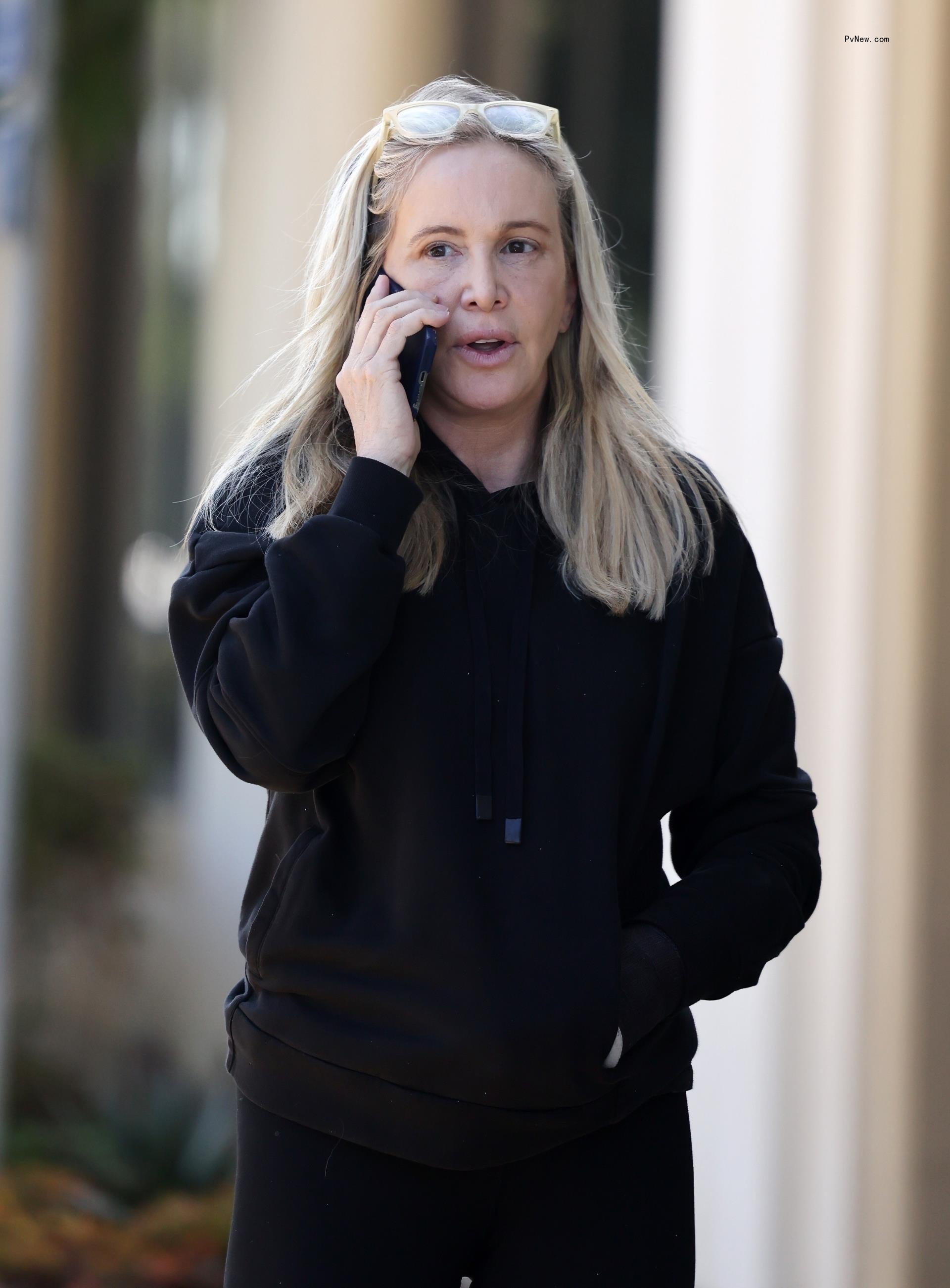 Shannon Beador walking and talking on the phone