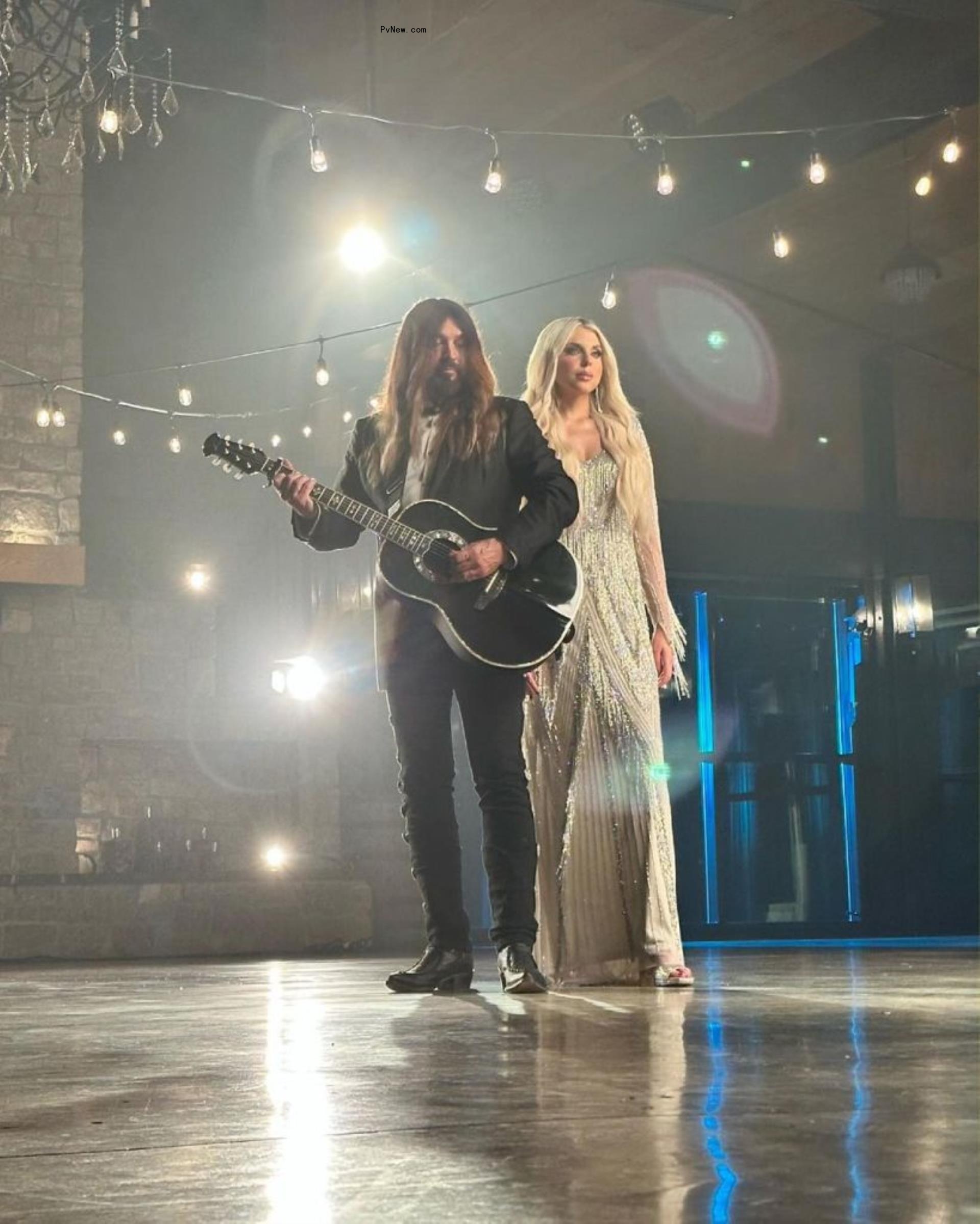 Billy Ray Cyrus and Firerose perform onstage