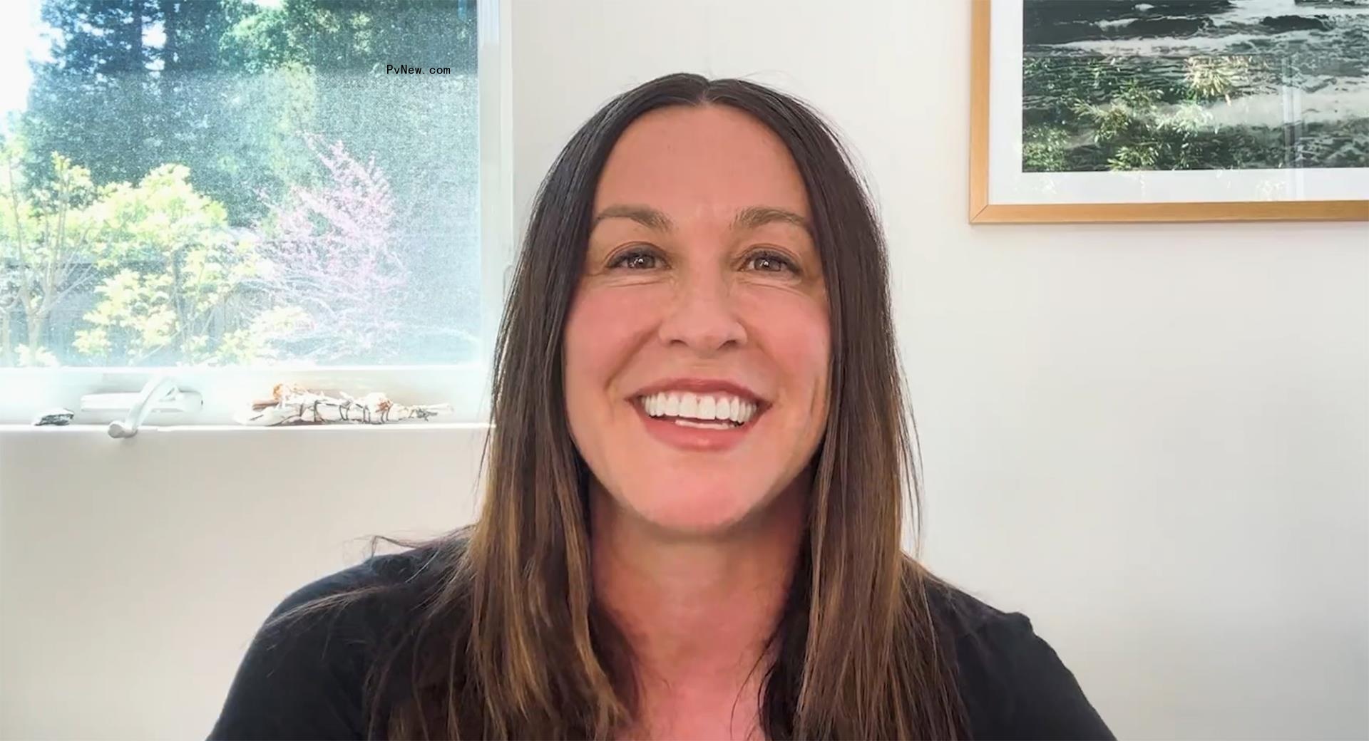 Alanis Morissette talking in a video