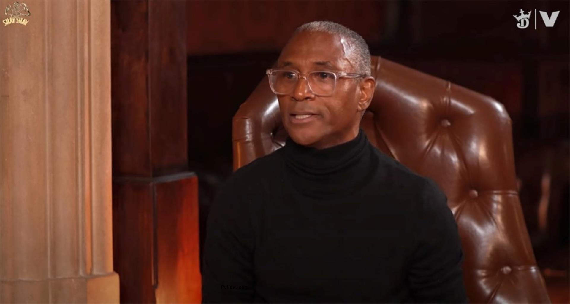 tommy davidson sitting in a leather chair
