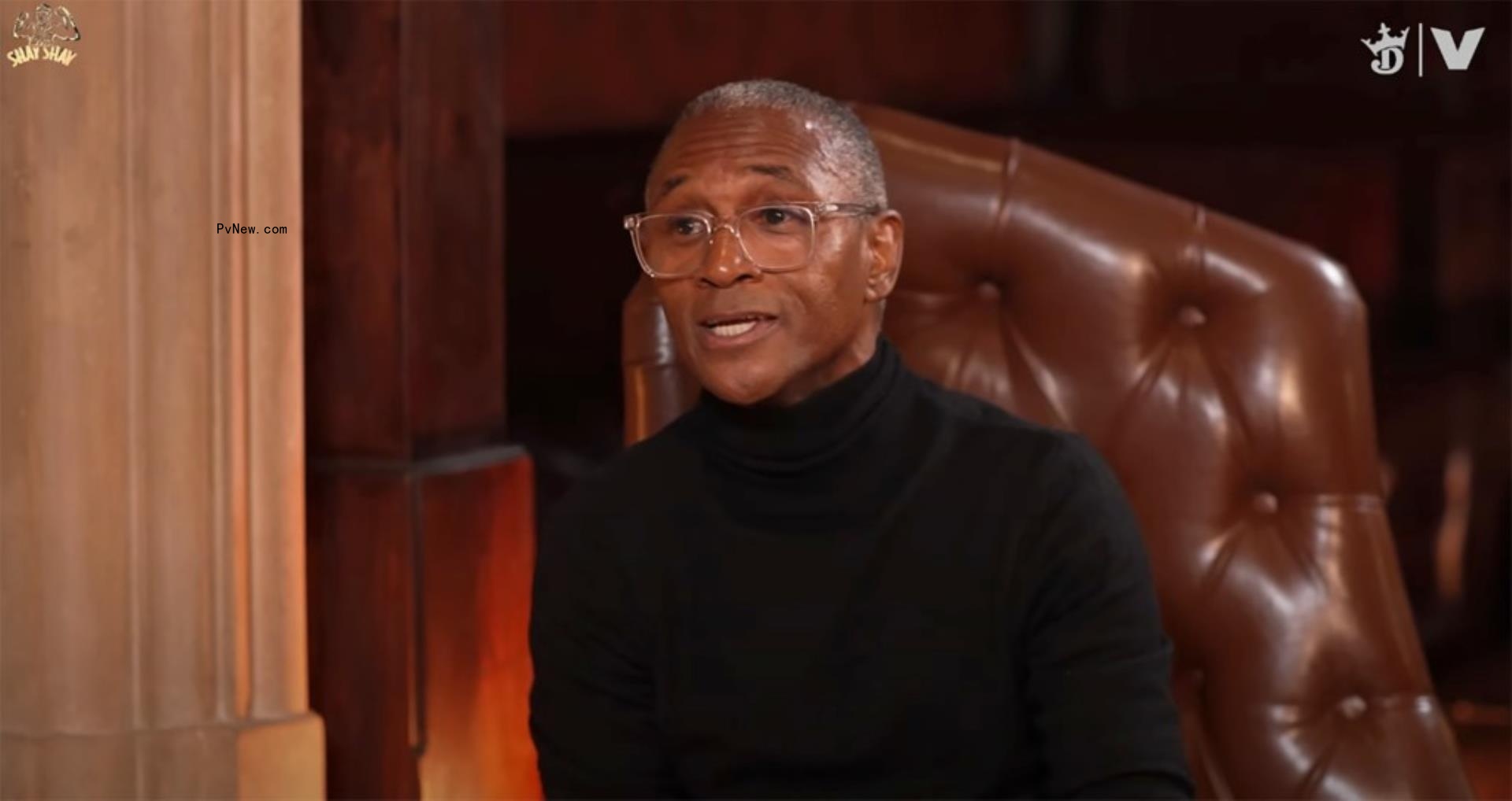 tommy davidson sitting in a leather chair