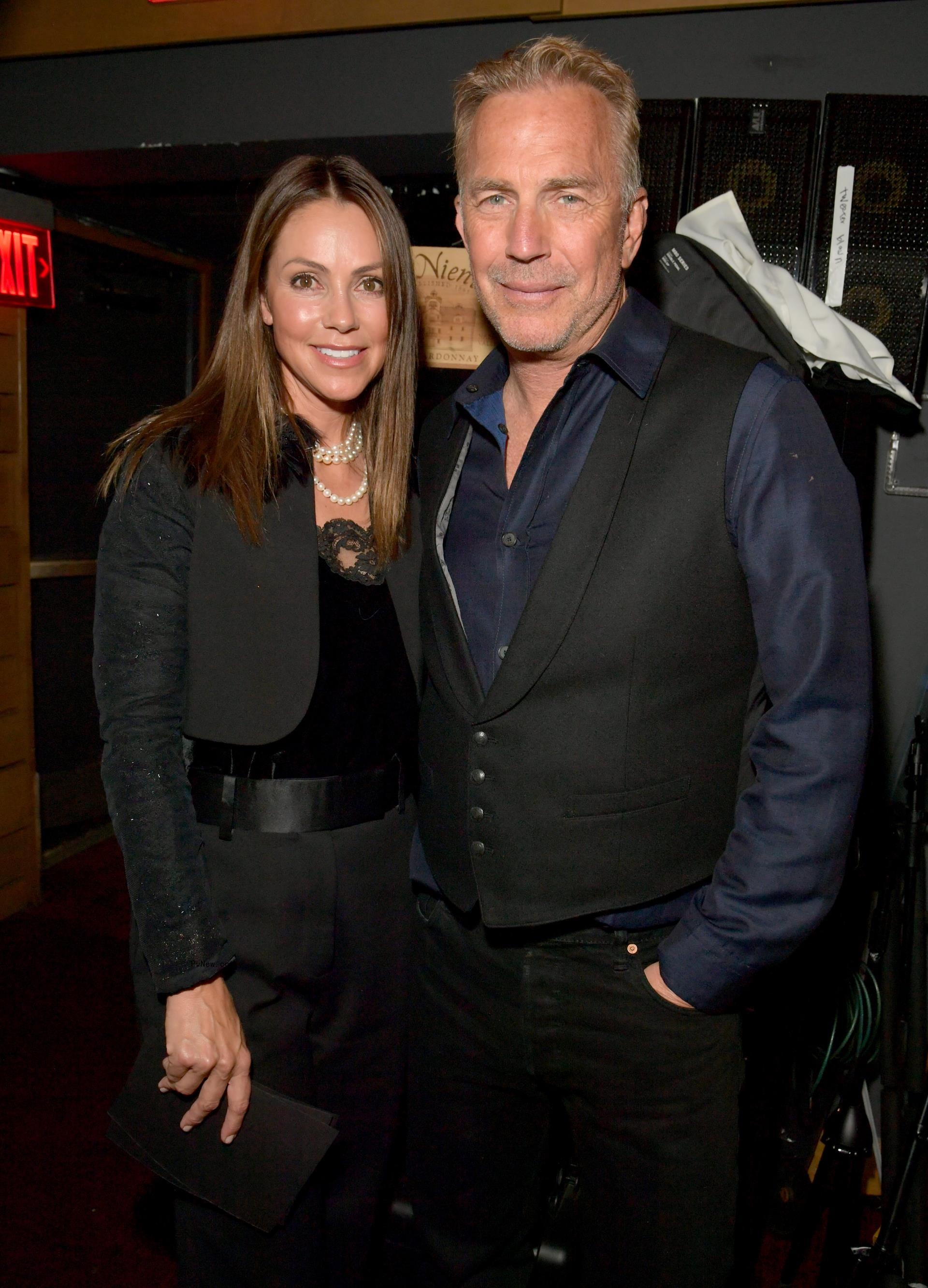 Christine Costner and Kevin Costner posing for a photo together
