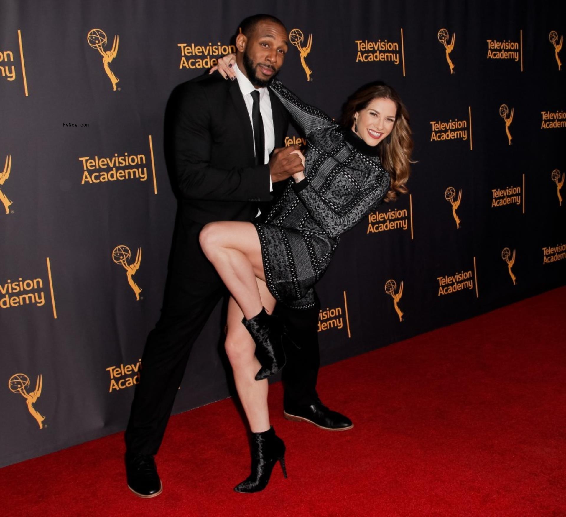Allison Holker and Stephen 'tWitch' Boss on a red carpet. 