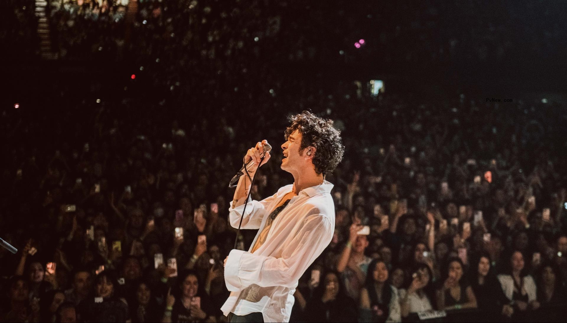 The 1975’s Matty Healy Lifts the Curtain on Band’s Biggest Tour Yet