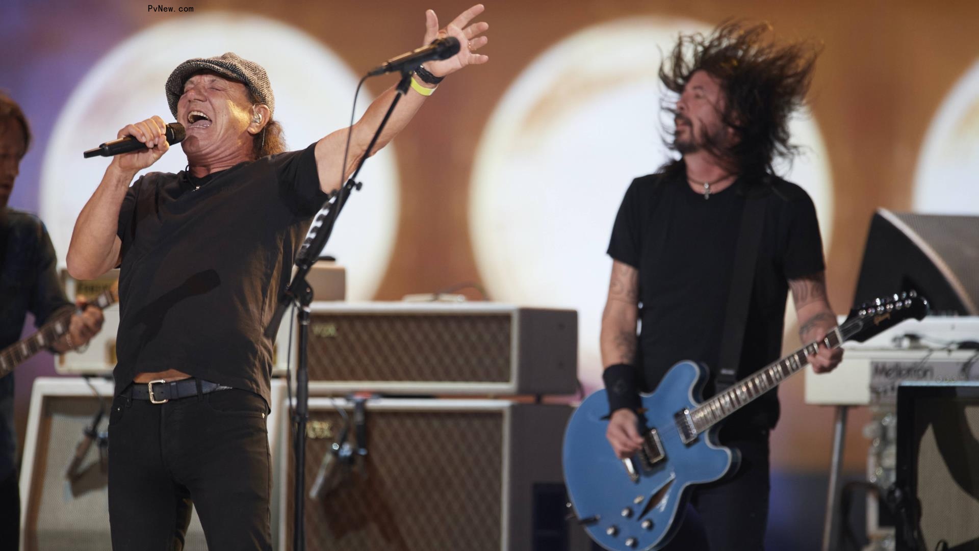 At ‘Vax Live’ Stadium Shoot, Foo Fighters and Brian Johnson Are ‘Back in Black,’ and J.Lo Is Back With Mom