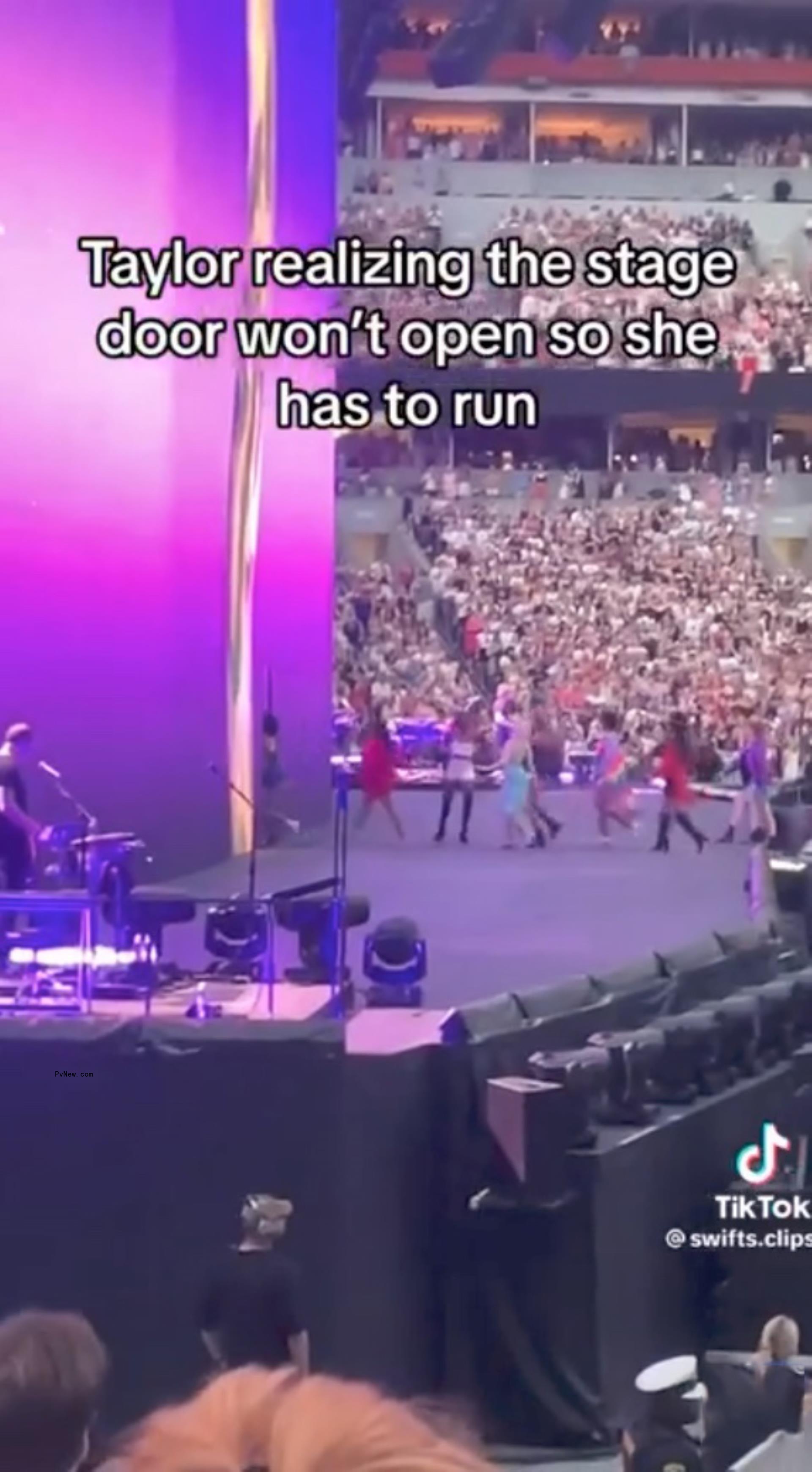 Taylor Swift running on stage