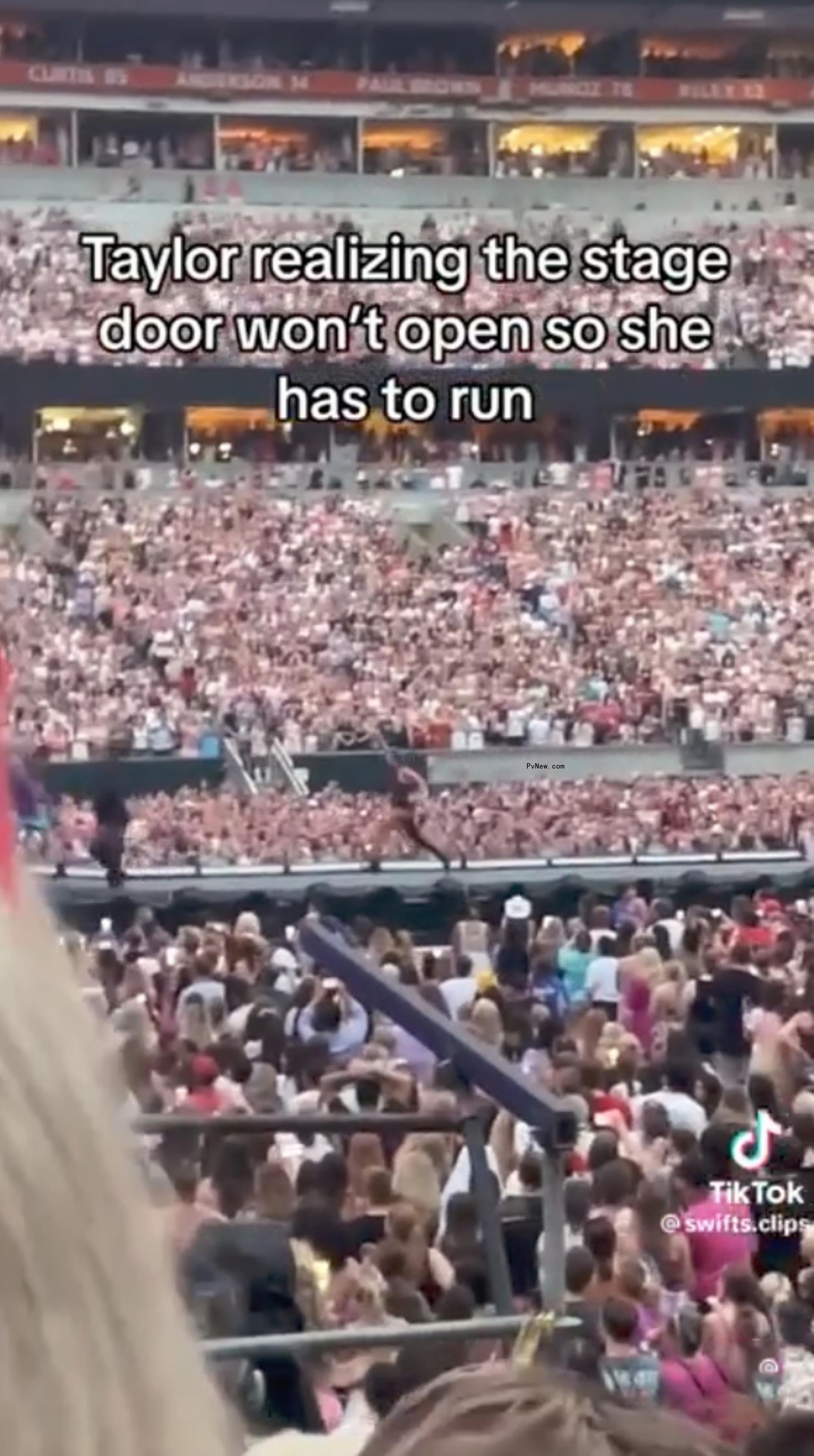 Taylor Swift running on stage