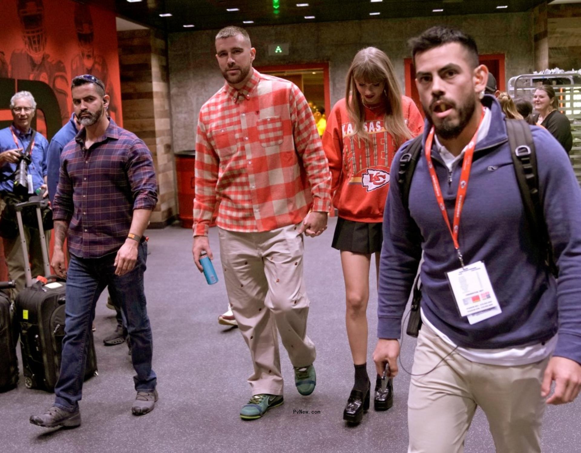 Taylor Swift and Travis Kelce at his game.