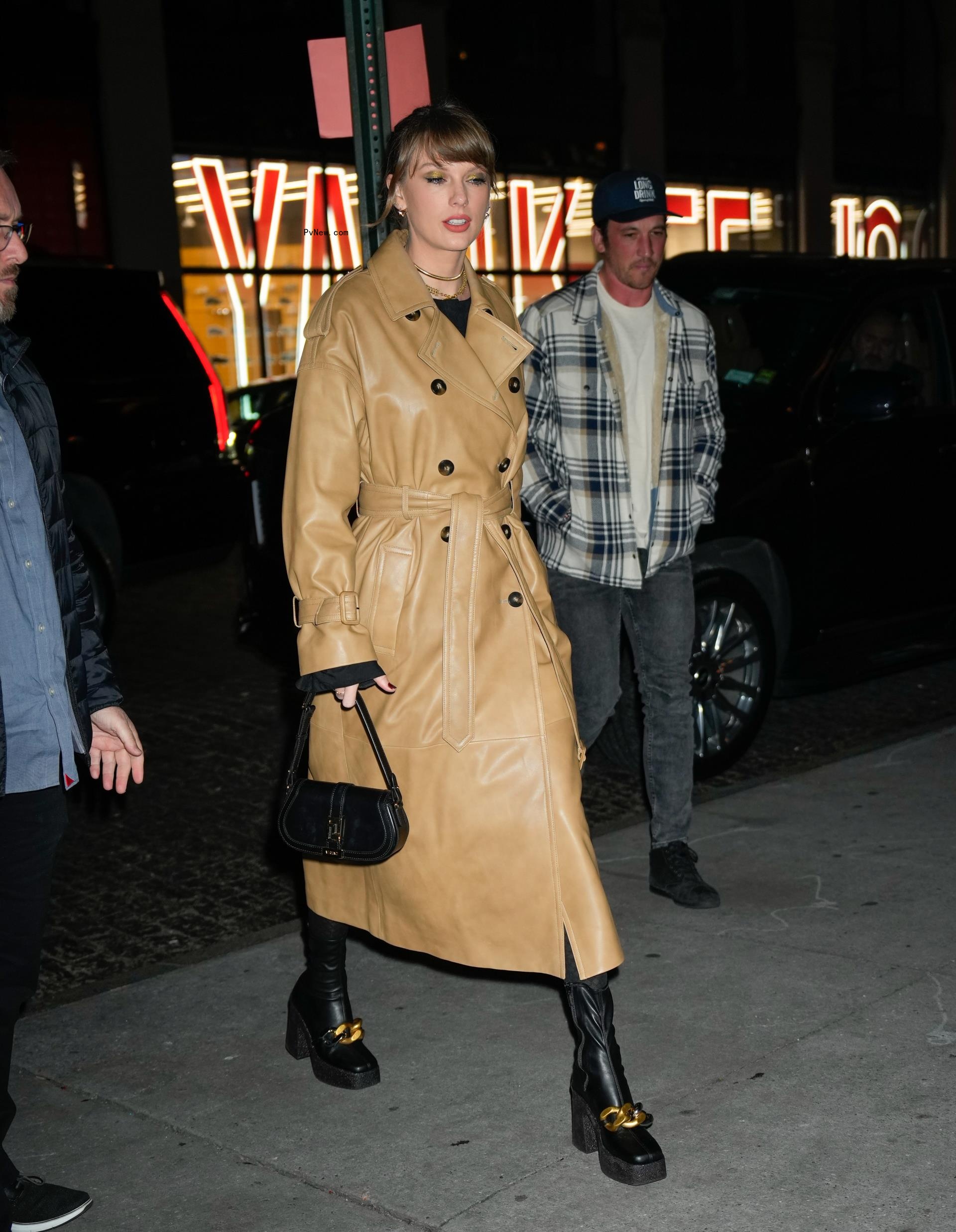 Taylor Swift and Miles Teller are seen on December 12, 2023 in New York City.