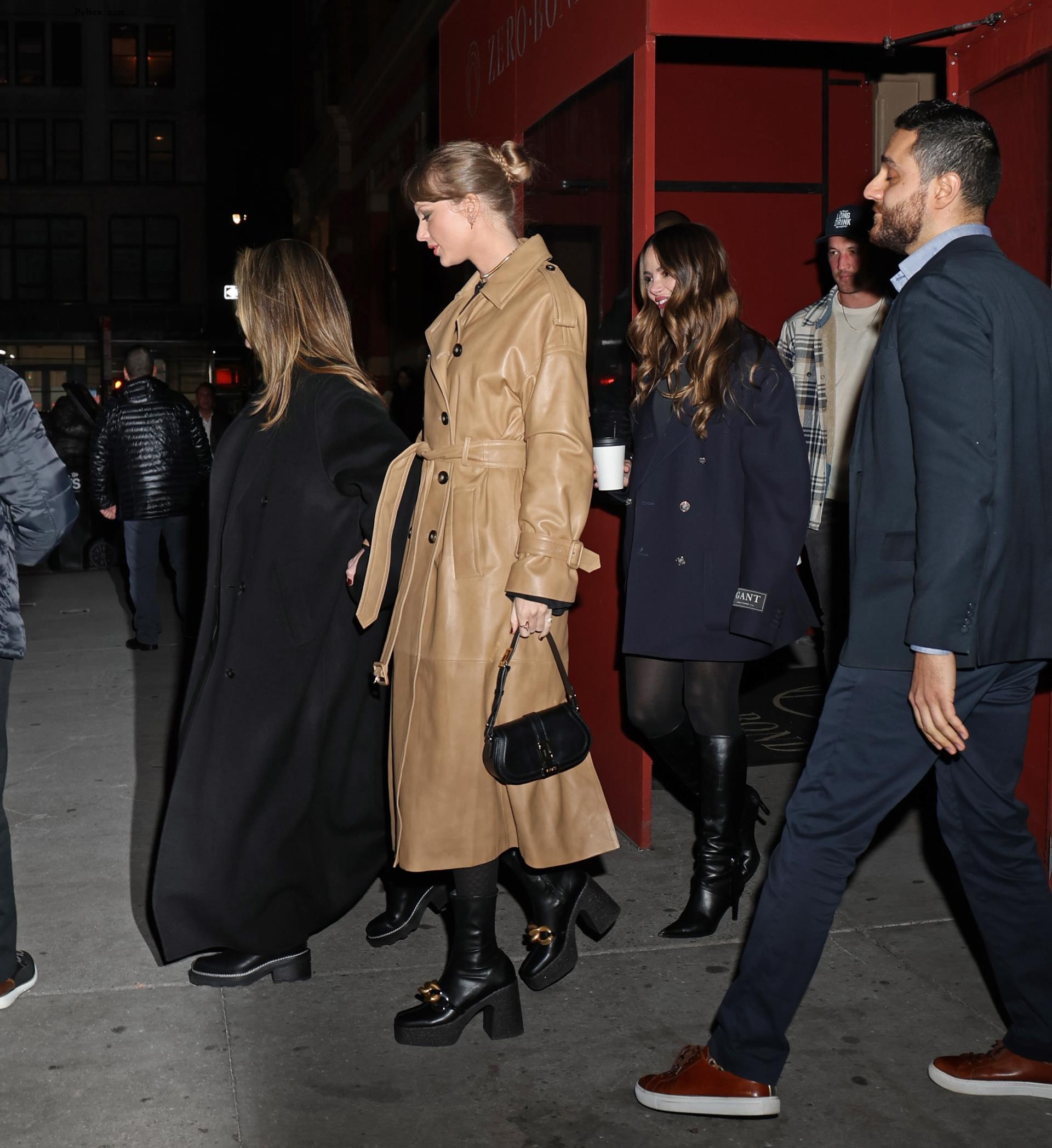 Taylor Swift and Miles Teller are seen on December 12, 2023 in New York City.